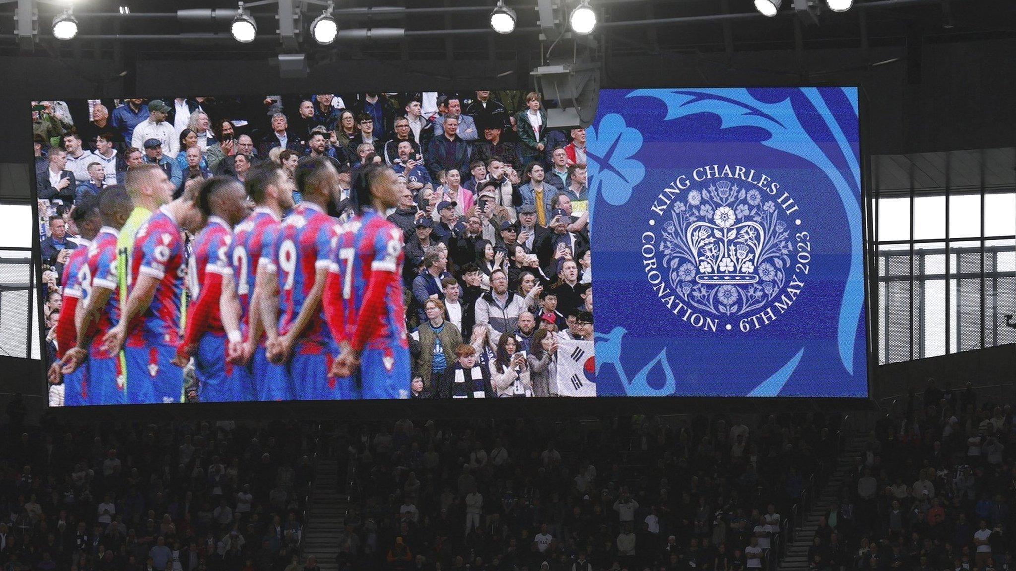 Tottenham and Crystal Palace players observe the national anthem at the Tottenham Hotspur Stadium