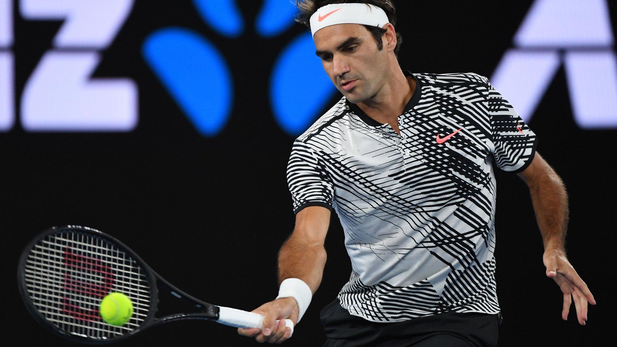 Roger Federer plays a forehand shot