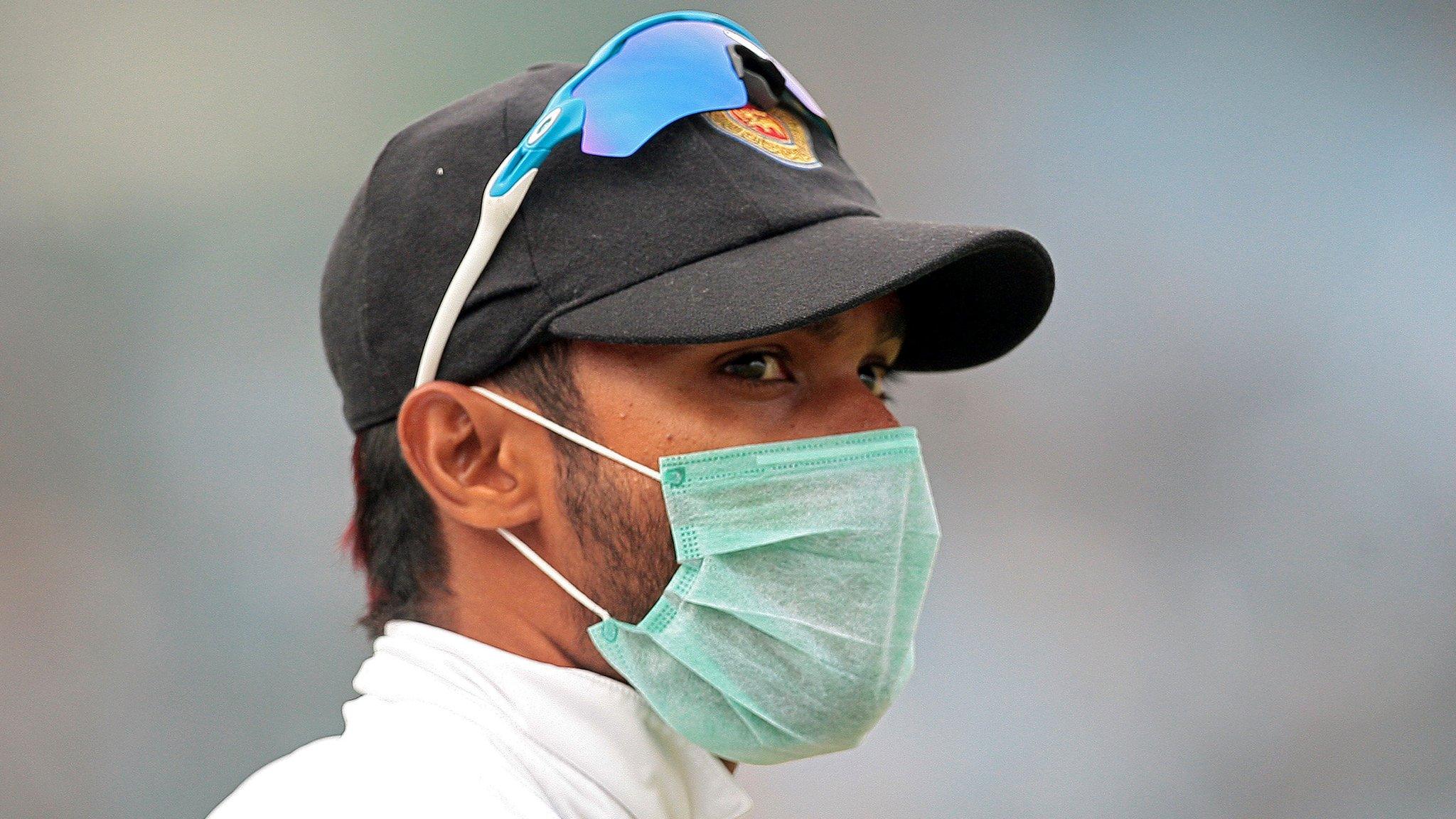 Some Sri Lanka players have taken to wearing masks while fielding in Delhi against India