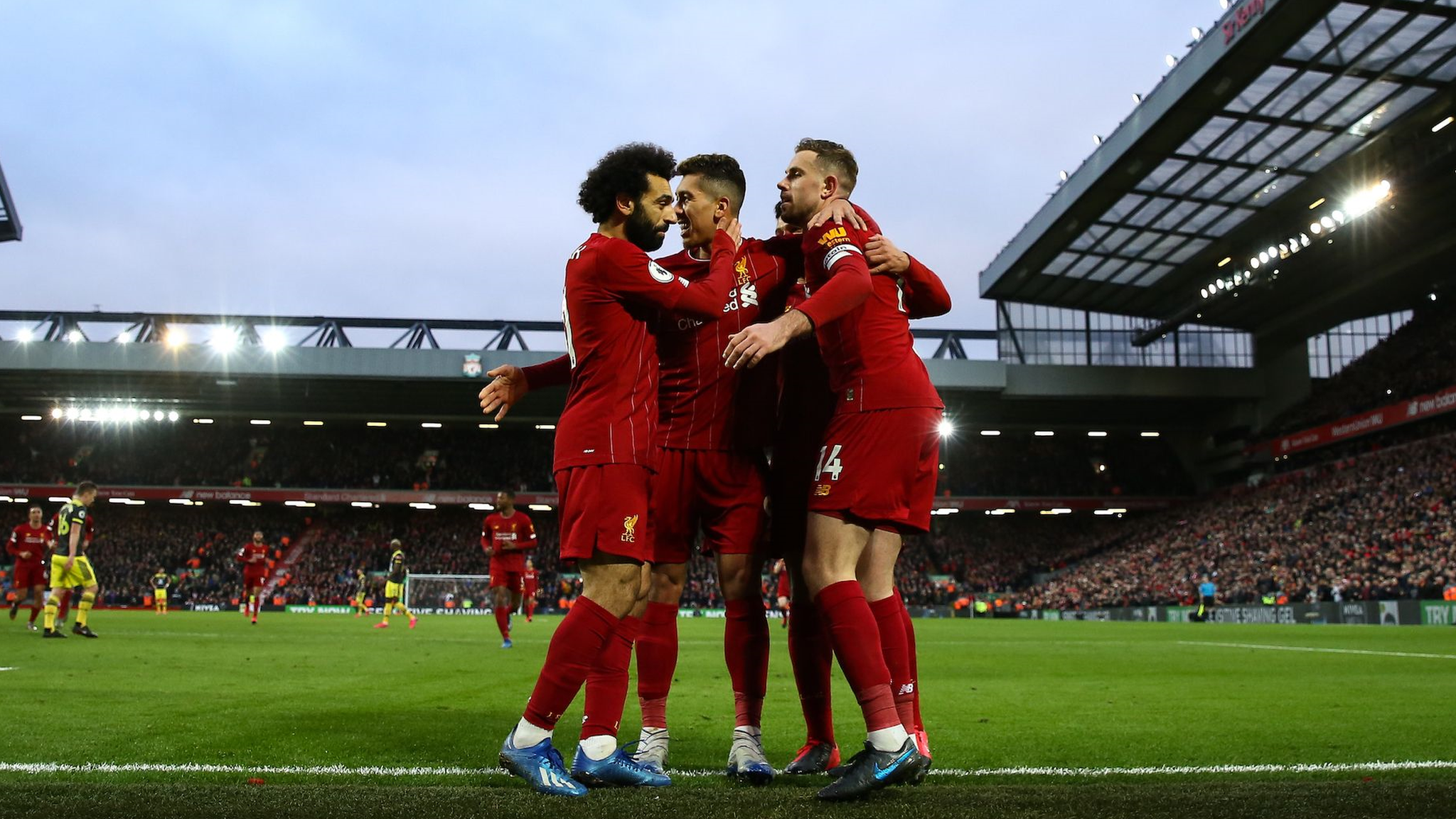 Liverpool players celebrate a goal at Anfield