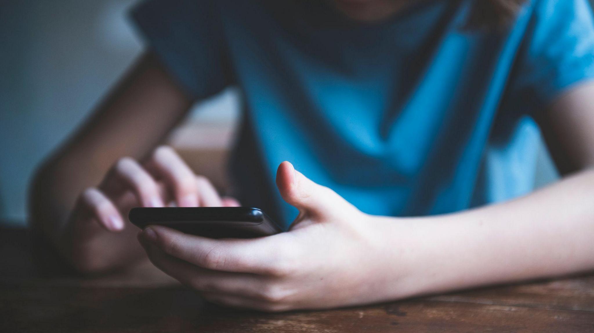 boy using phone. 