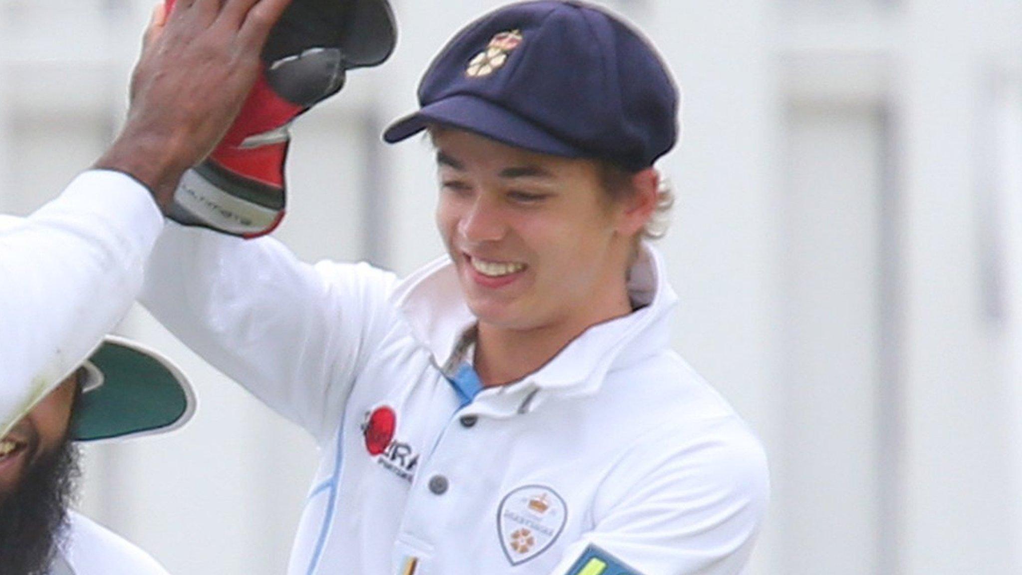 Chesney Hughes of Derbyshire (left) celebrates with Harvey Hosein