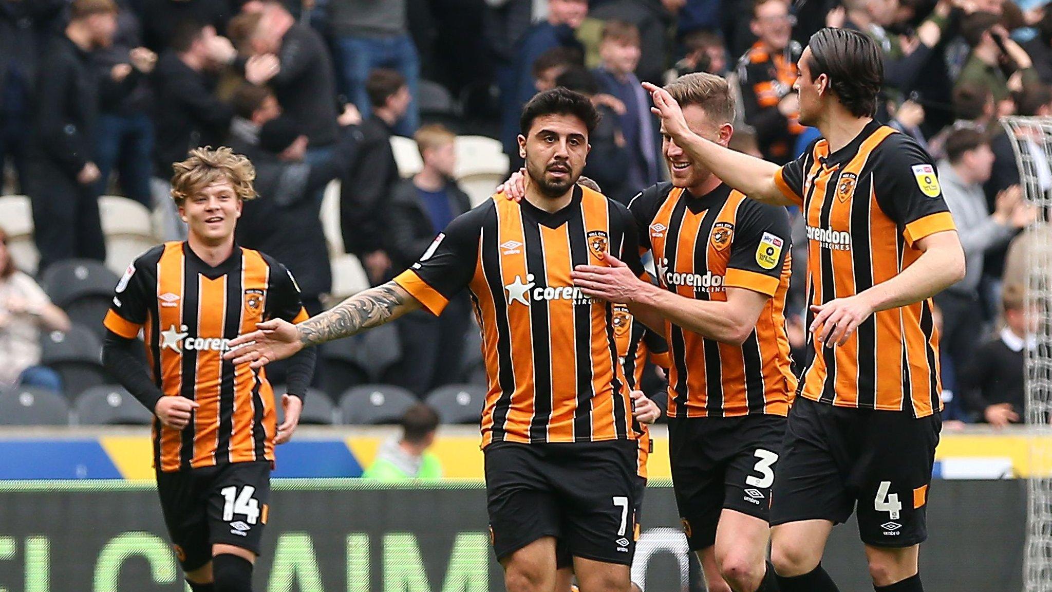 Hull celebrate Ozan Tufan's penalty