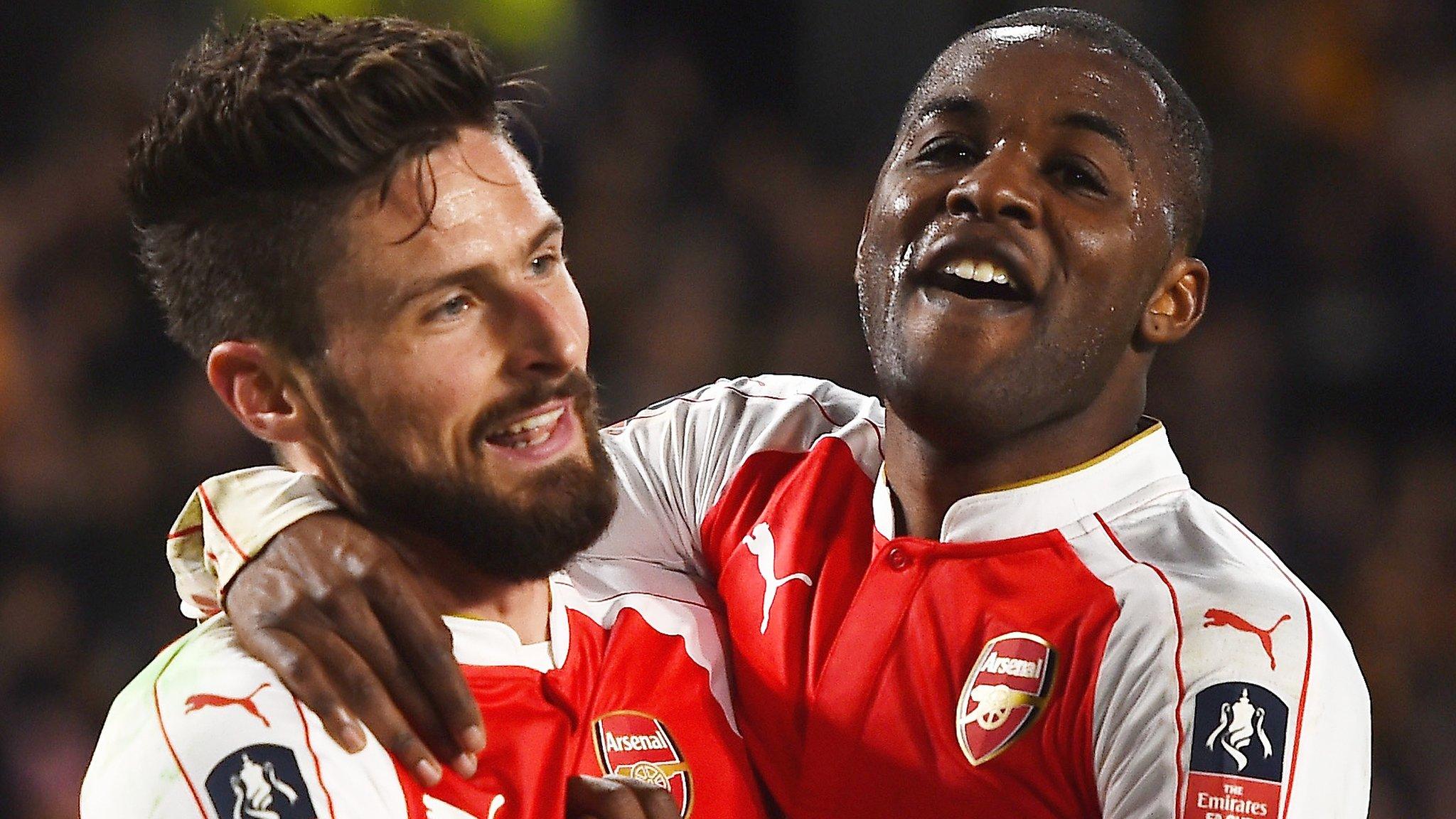 Arsenal striker Olivier Giroud with team-mate Joel Campbell