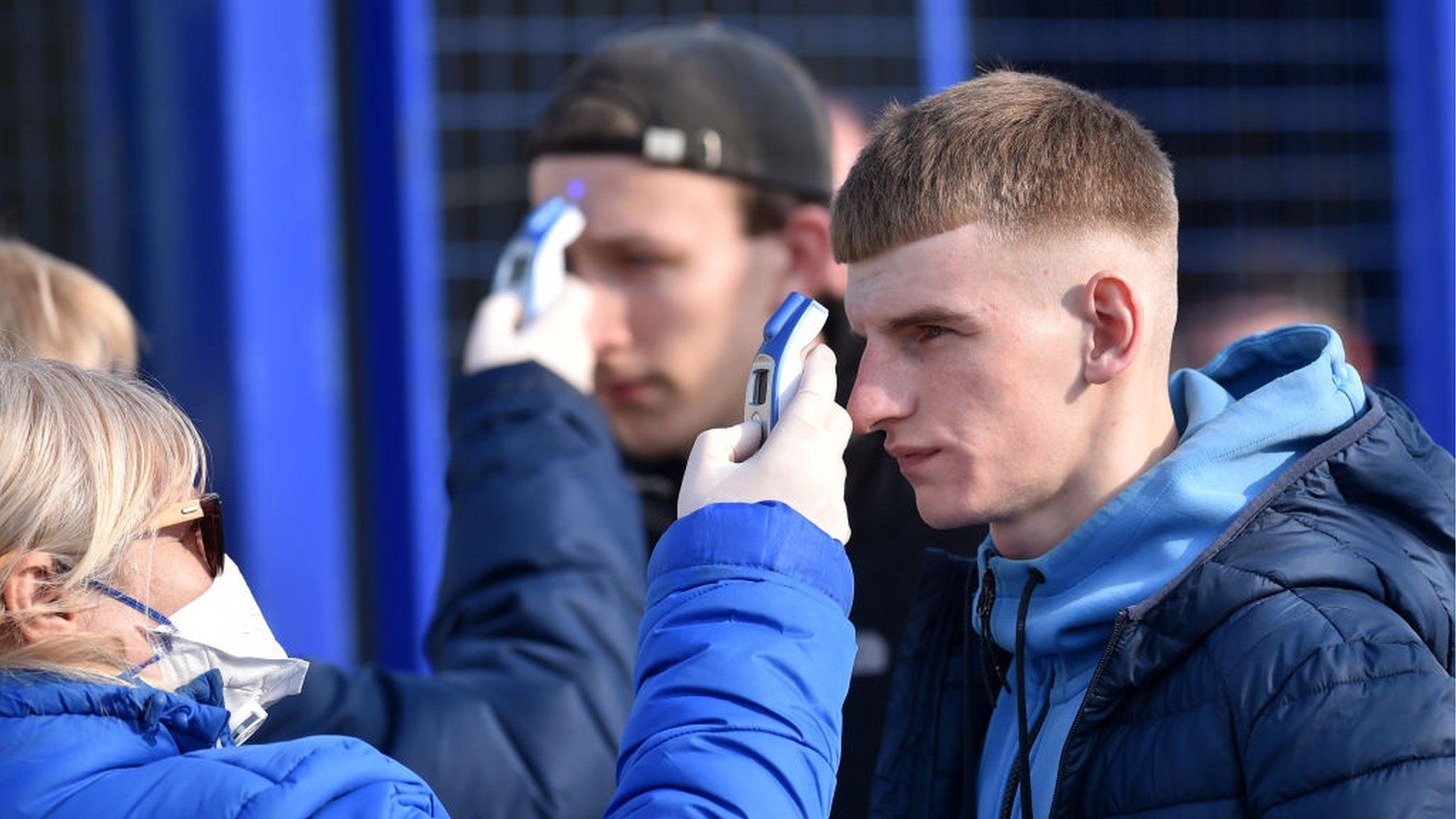 Fans have their temperatures checked at Minsk derby