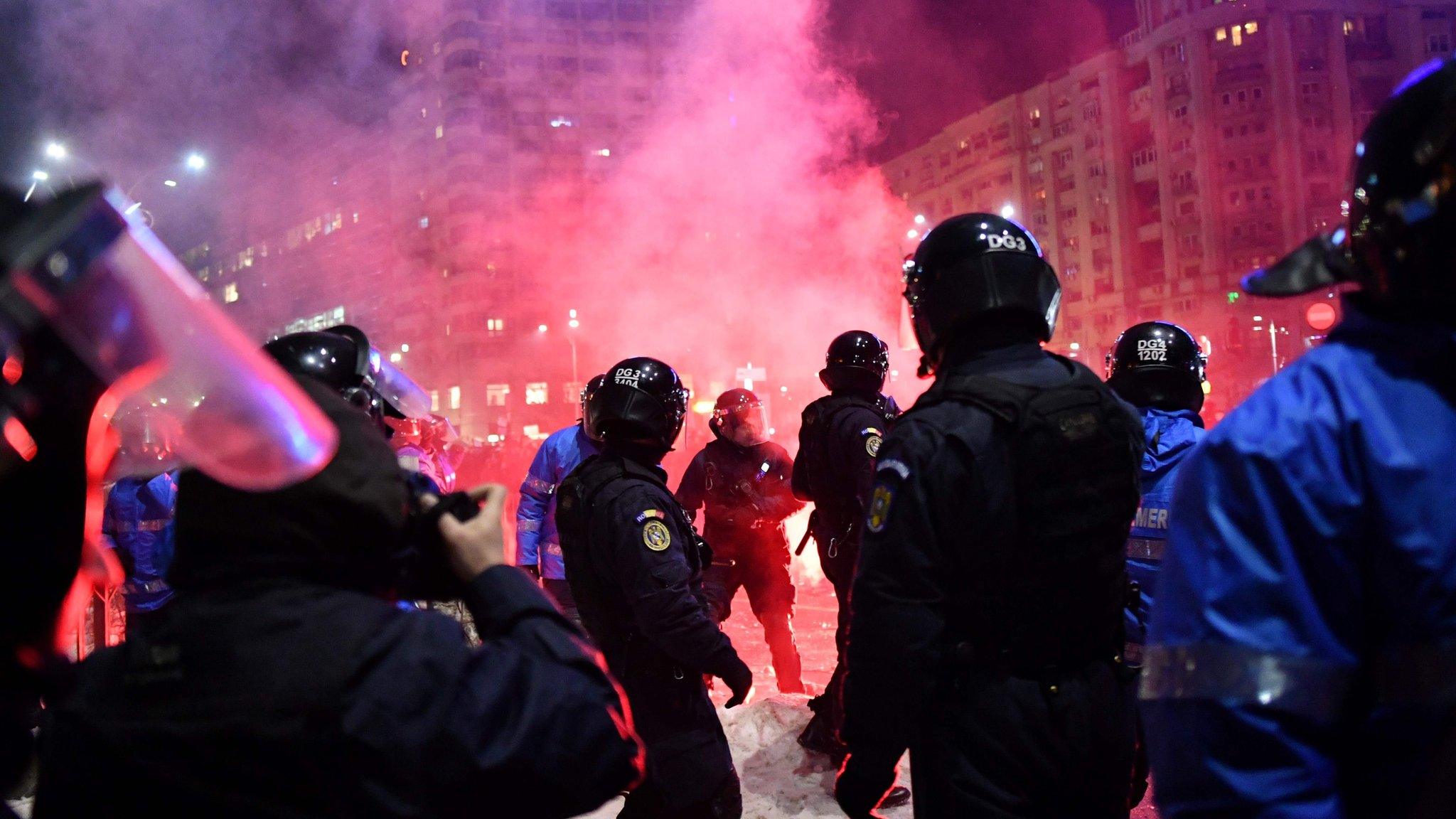 Romanian riot police clash with protesters in front of government offices in Bucharest. 1 February 2017