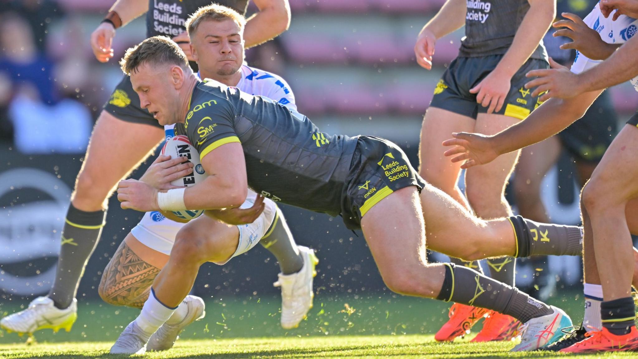 Leeds Rhinos' Harry Newman diving for the try line