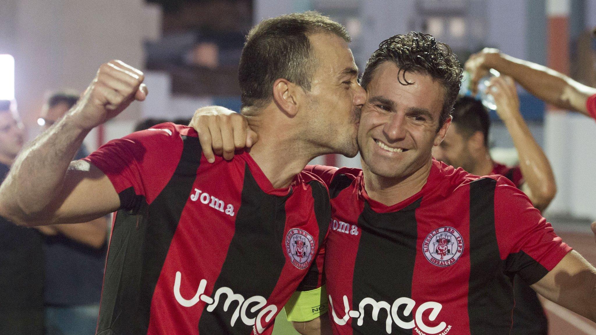 Roy Chipolina and goalscorer Lee Casciaro celebrate their unlikely victory