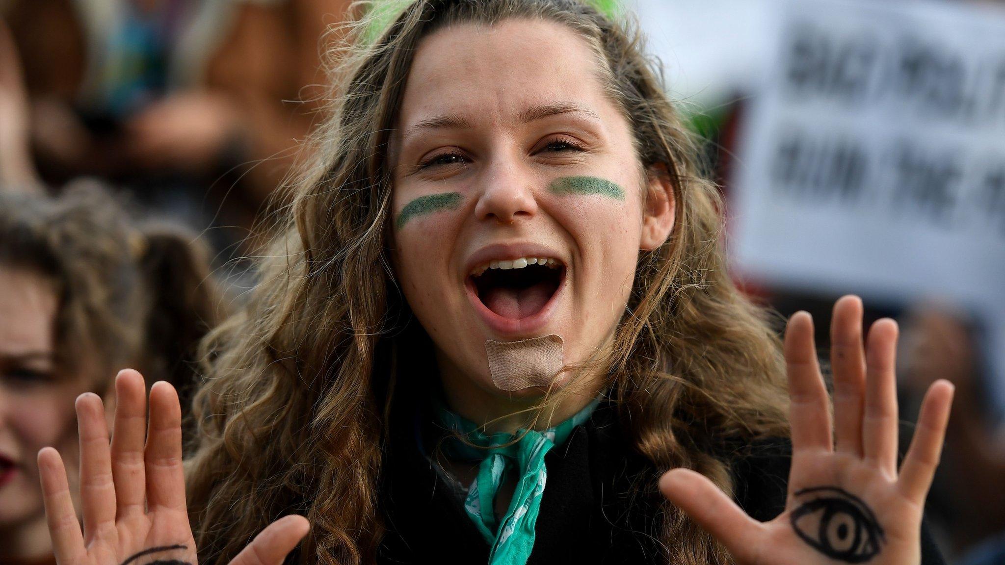 A demonstrator takes part in a protest on climate emergency in Madrid