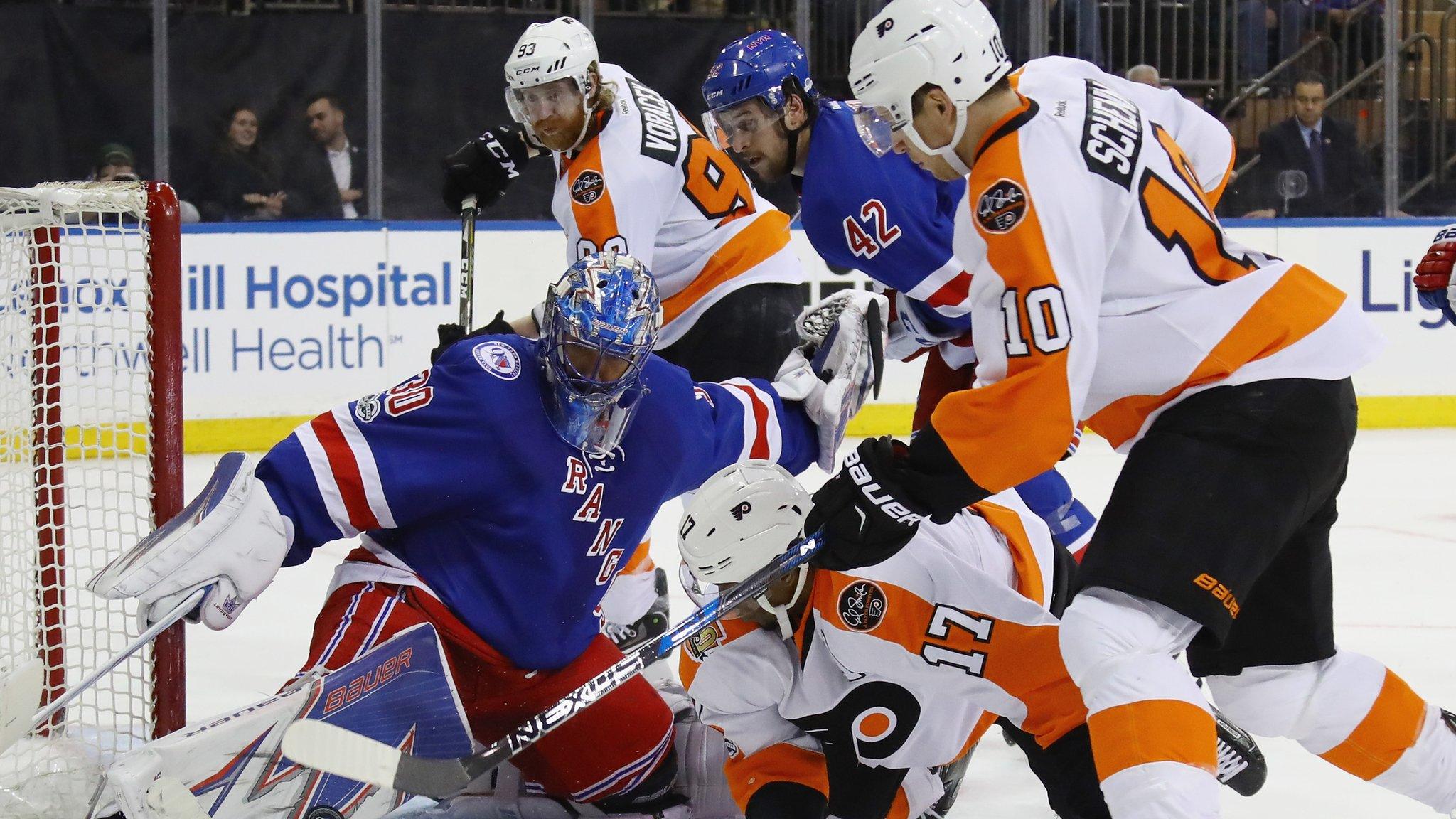 NHL action, featuring New York Rangers netminder Henrik Lundqvist