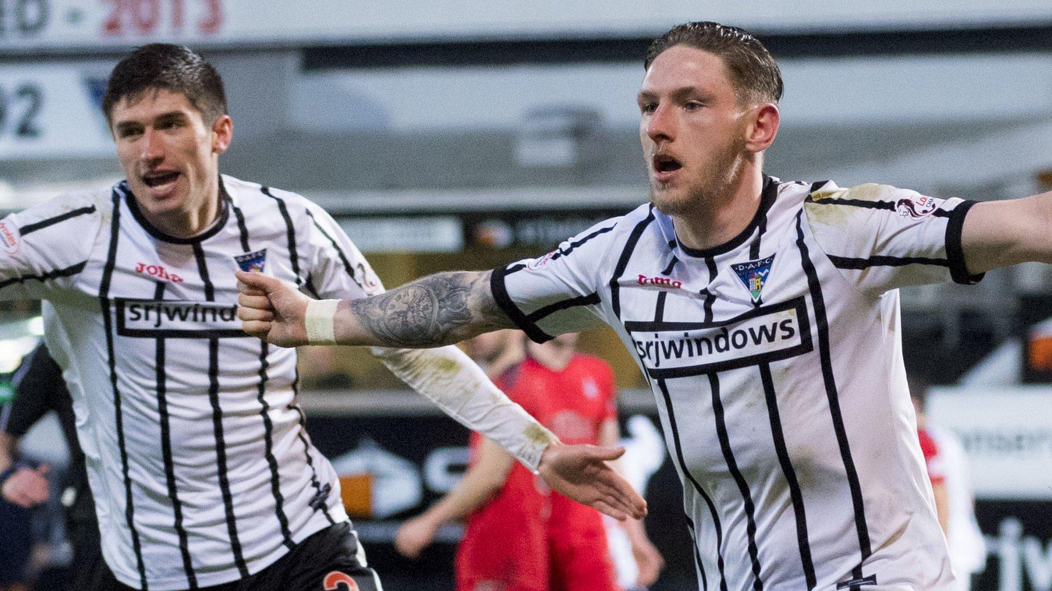 Dunfermline's Declan McManus (right) celebrates his goal against Falkirk