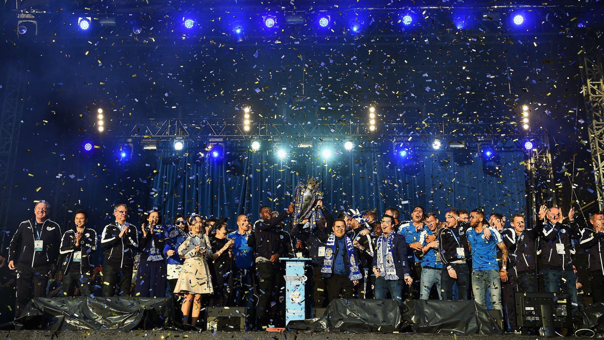 Leicester City show the trophy to the fans during the celebrations at Victoria Park