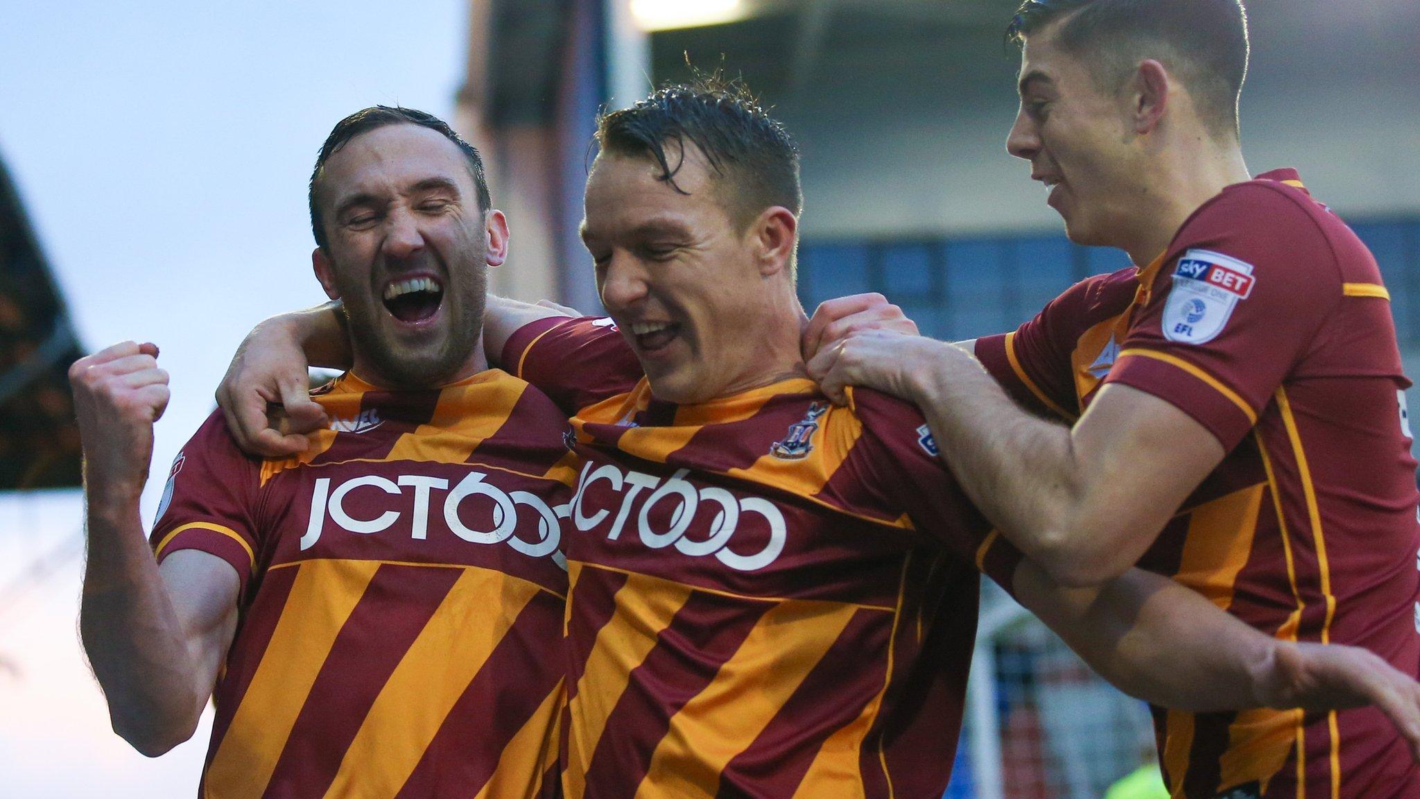 Bradford celebrate a goal at Oldham