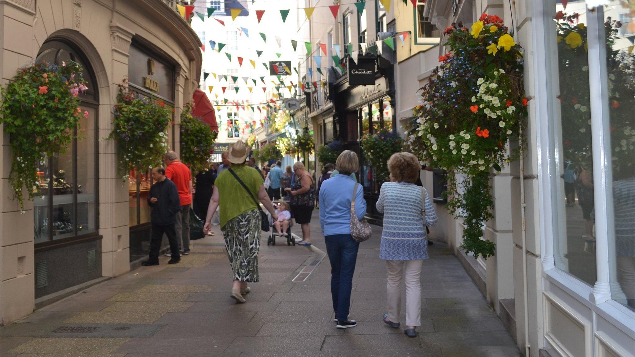 People in the Arcade in St Peter Port, Guernsey