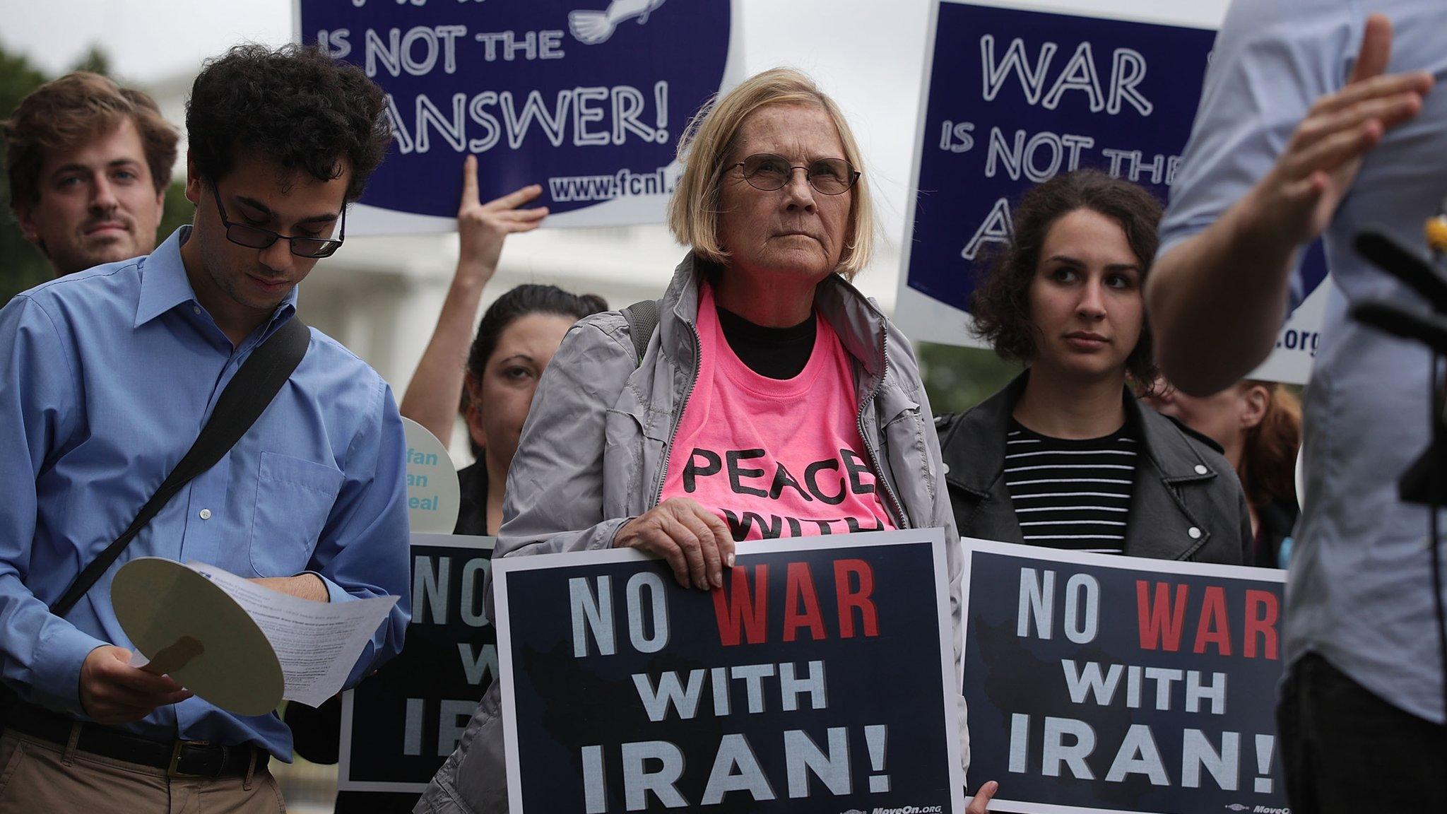 Activists protest in front of the White House October 12, 2017