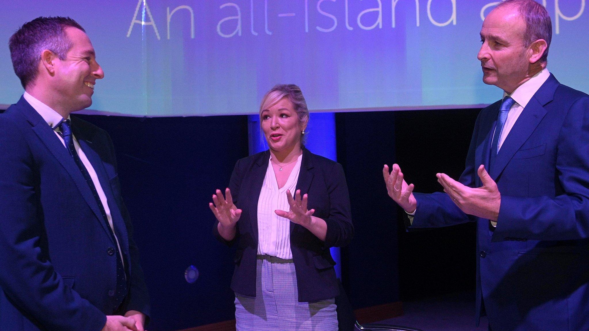 Taoiseach Mícheál Martin, with First Minister Paul Givan and Deputy First Minister Michelle O'Neill, at a climate conference at the SSE Arena Belfast on 8 October 2021