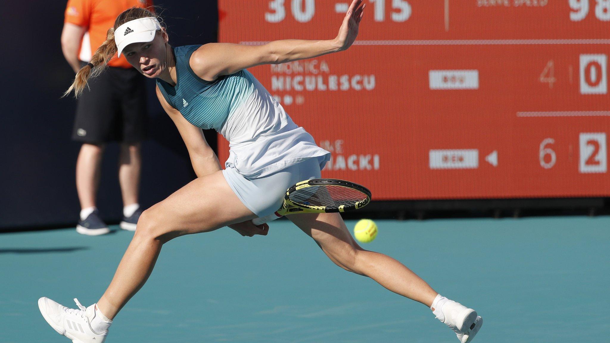Caroline Wozniacki of Denmark in action against Monica Niculescu of Romania during their women"s singles match at the Miami Open tennis tournament in Miami, Florida, USA, 23 March 2019. EPA/RHONA WISE
