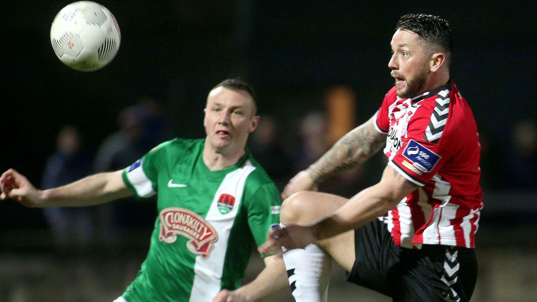 Candystripes striker Rory Patterson sends in a header against Cork City