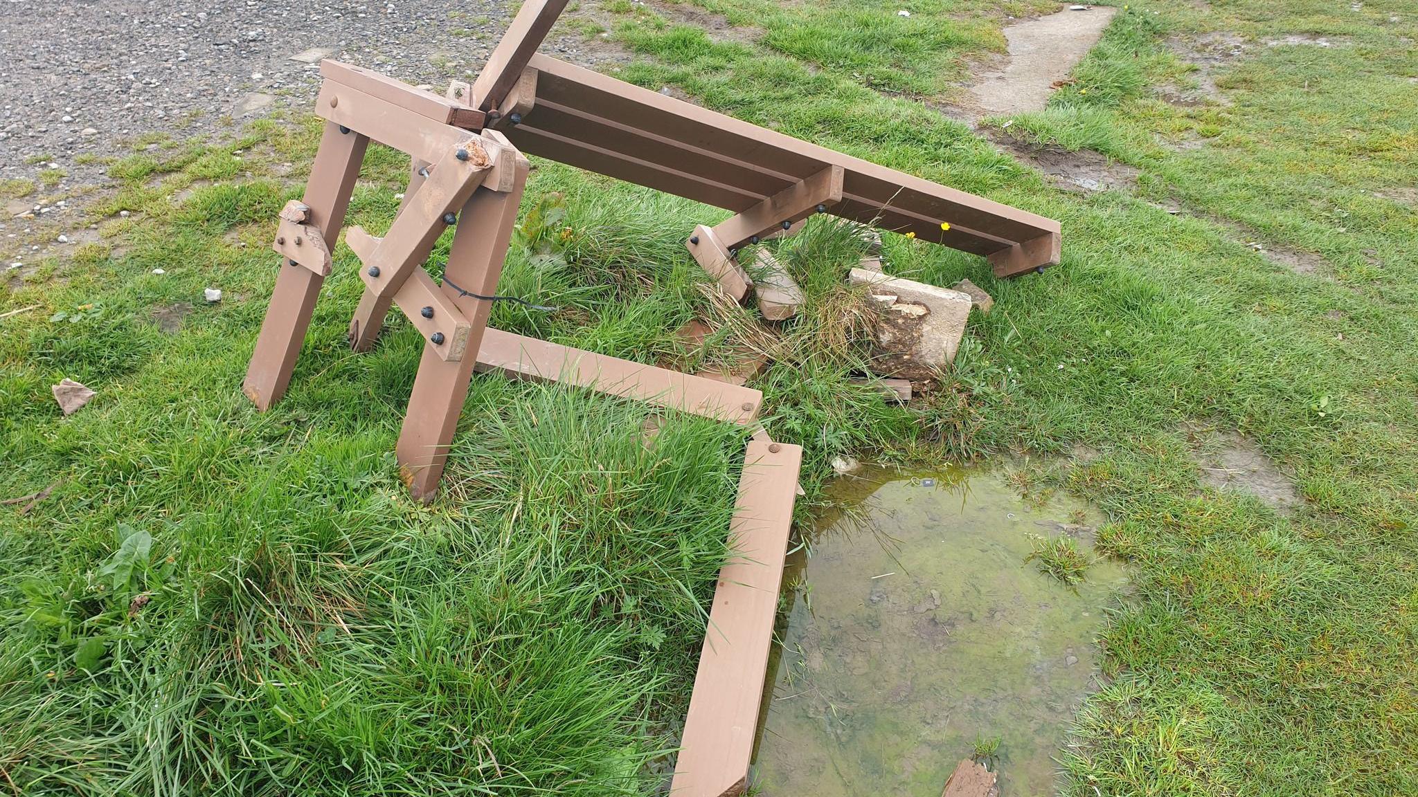 The damaged bench