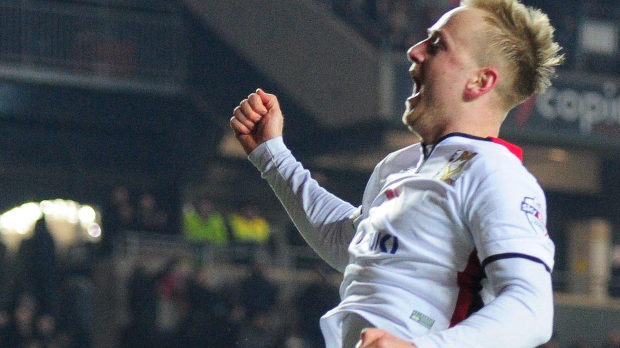 Ben Reeves scores from the spot for MK Dons