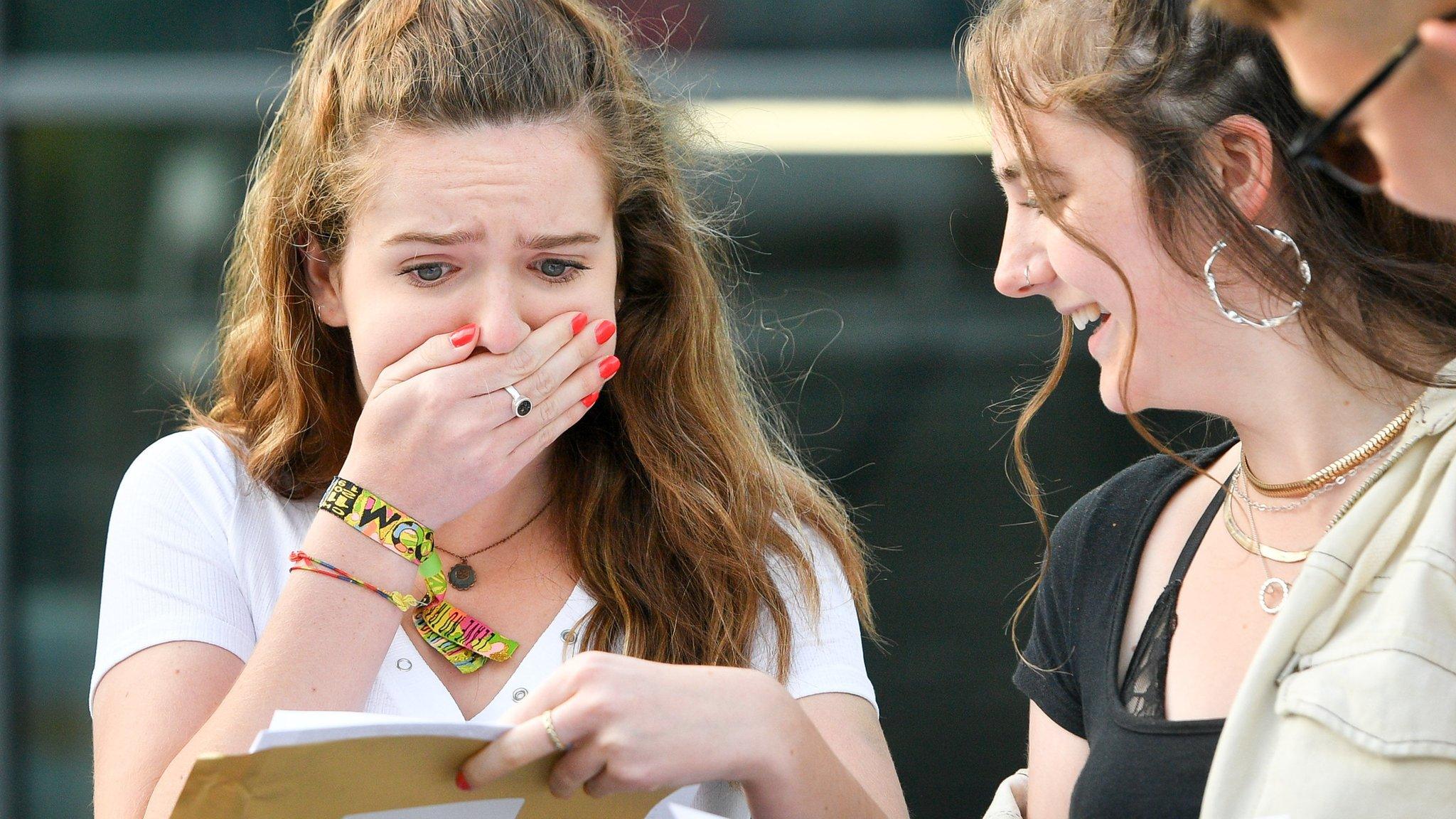 Shocked candidates receive results