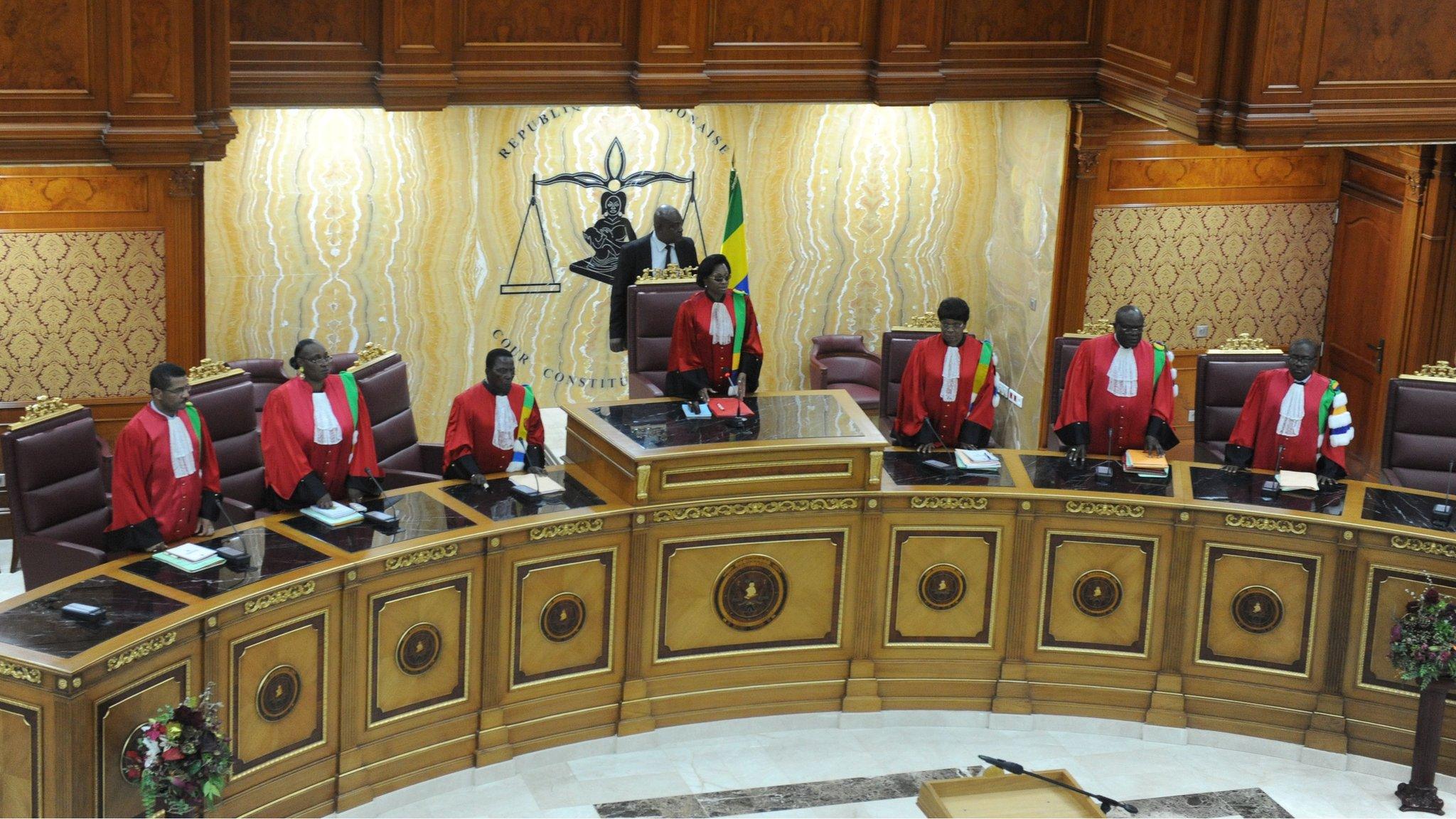 President of Gabonese Constitutional Court Marie-Madeleine Mborantsuo (C) takes her seat ahead of hearing in Libreville on September 22, 2016.