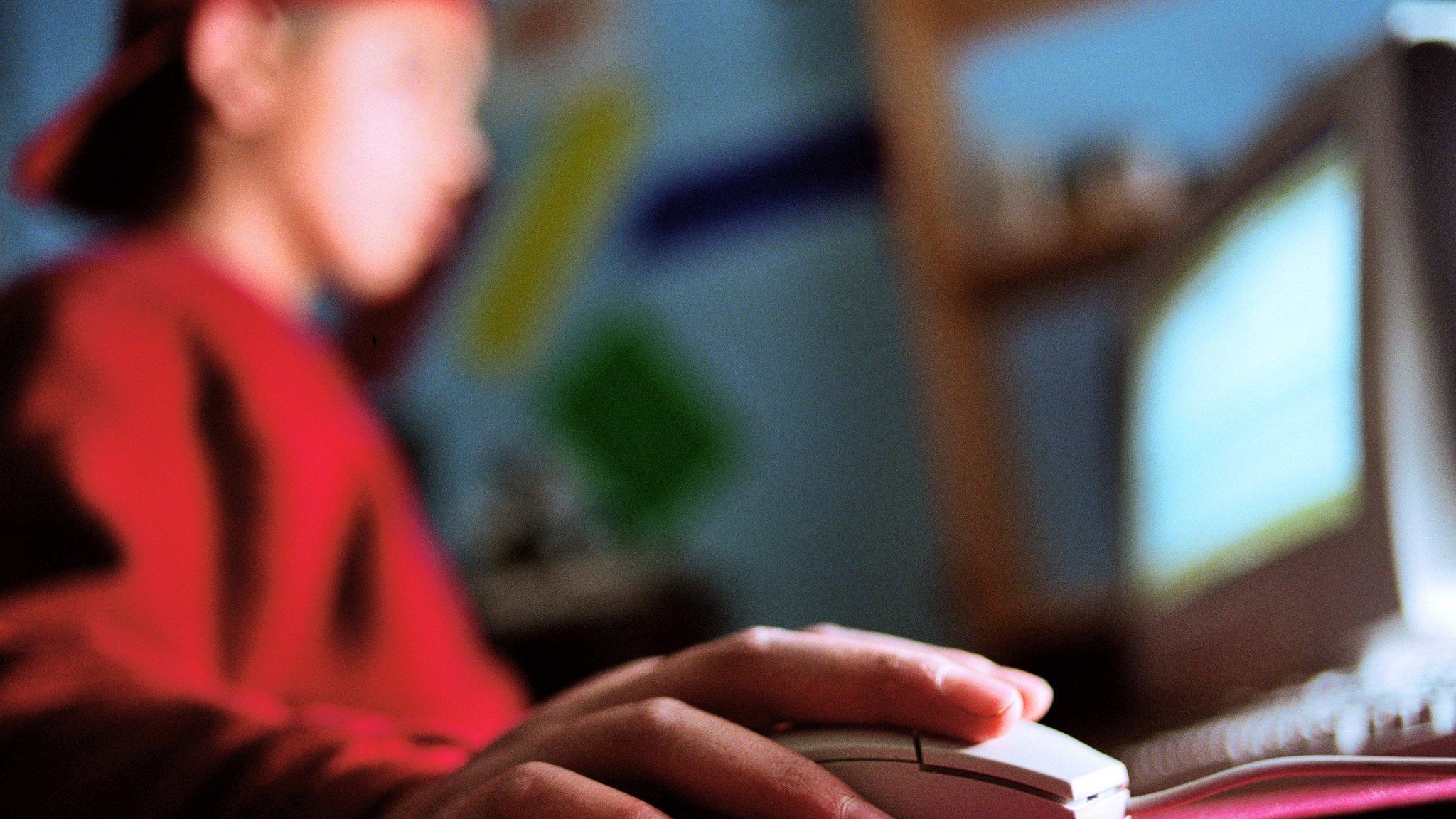 Boy using computer