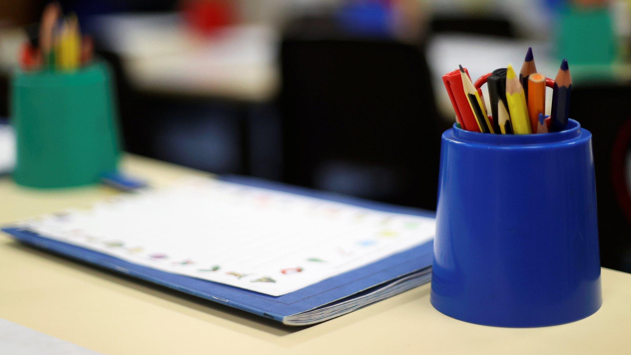 Primary school pencils on a desk