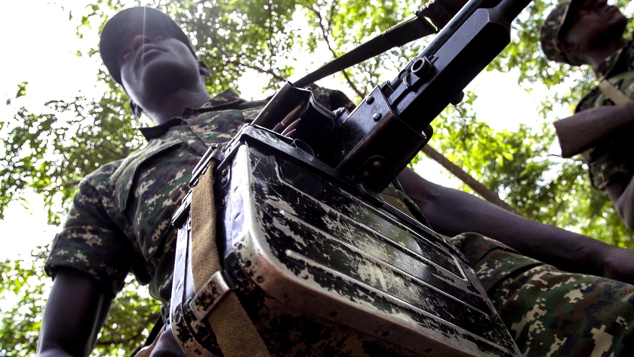 Ugandan soldier with gun