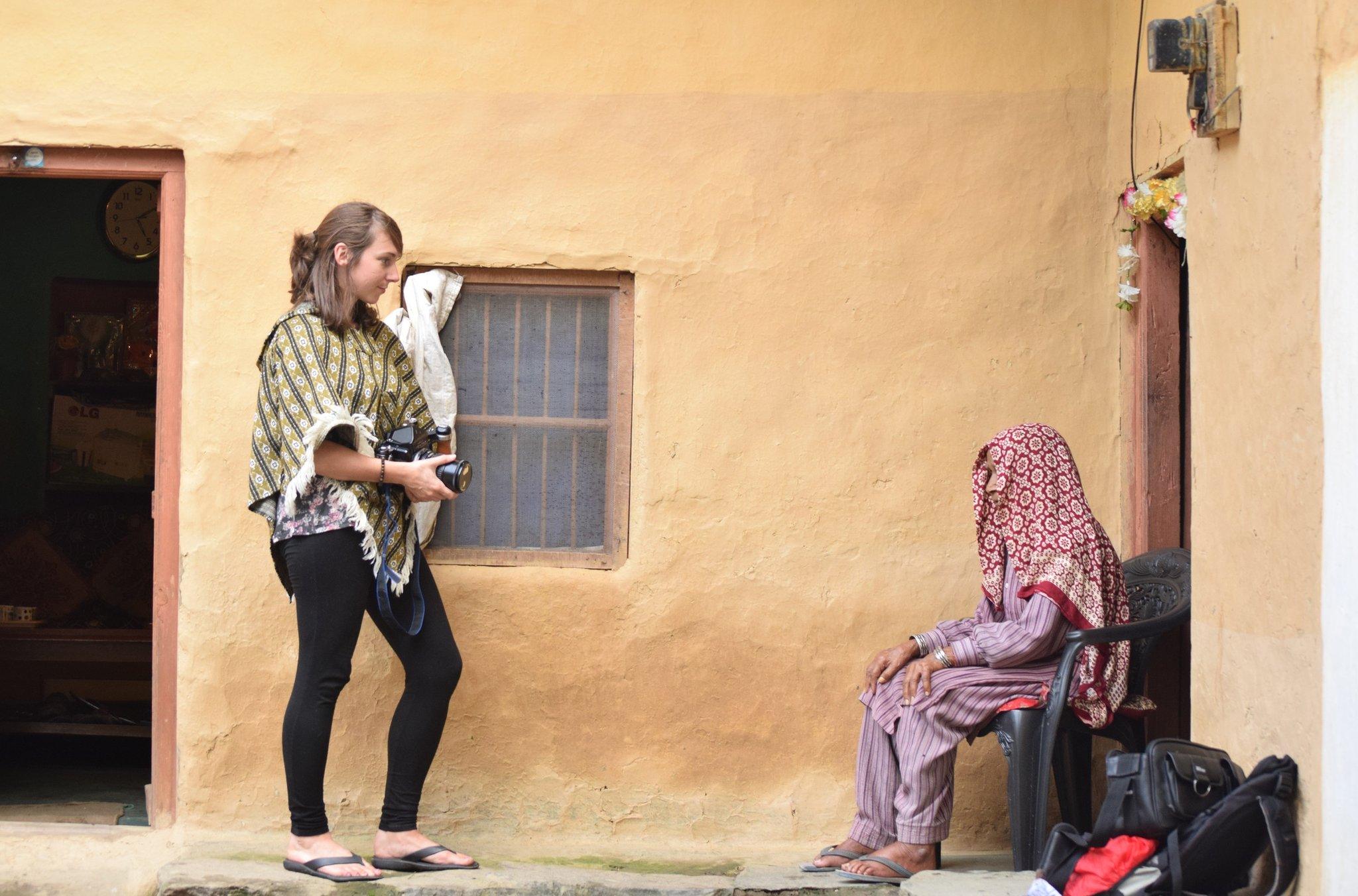 Carly Clarke working on her photography in India