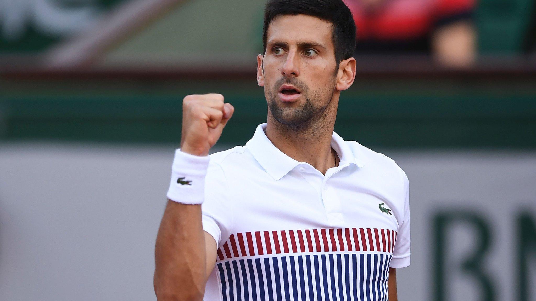 Novak Djokovic celebrates after winning a point