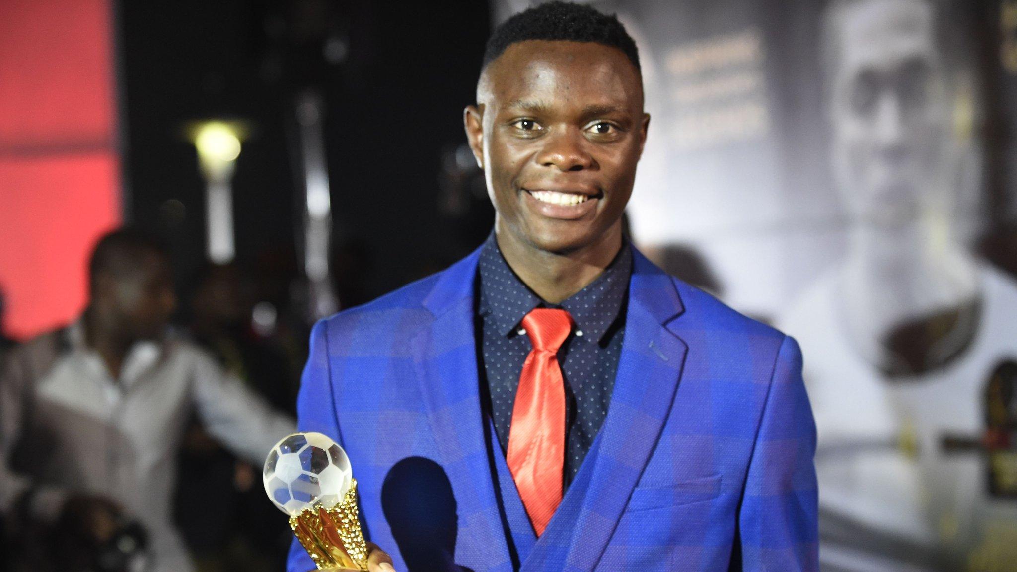 Patson Daka with the Youth trophy at the African Footballer of the Year Awards