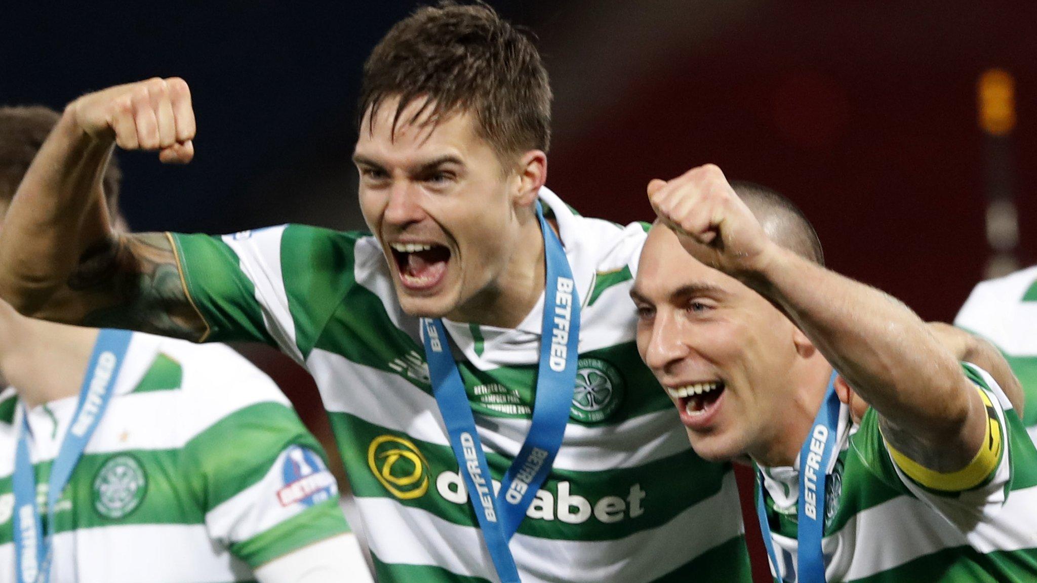 Celtic's Mikael Lustig and Scott Brown celebrate