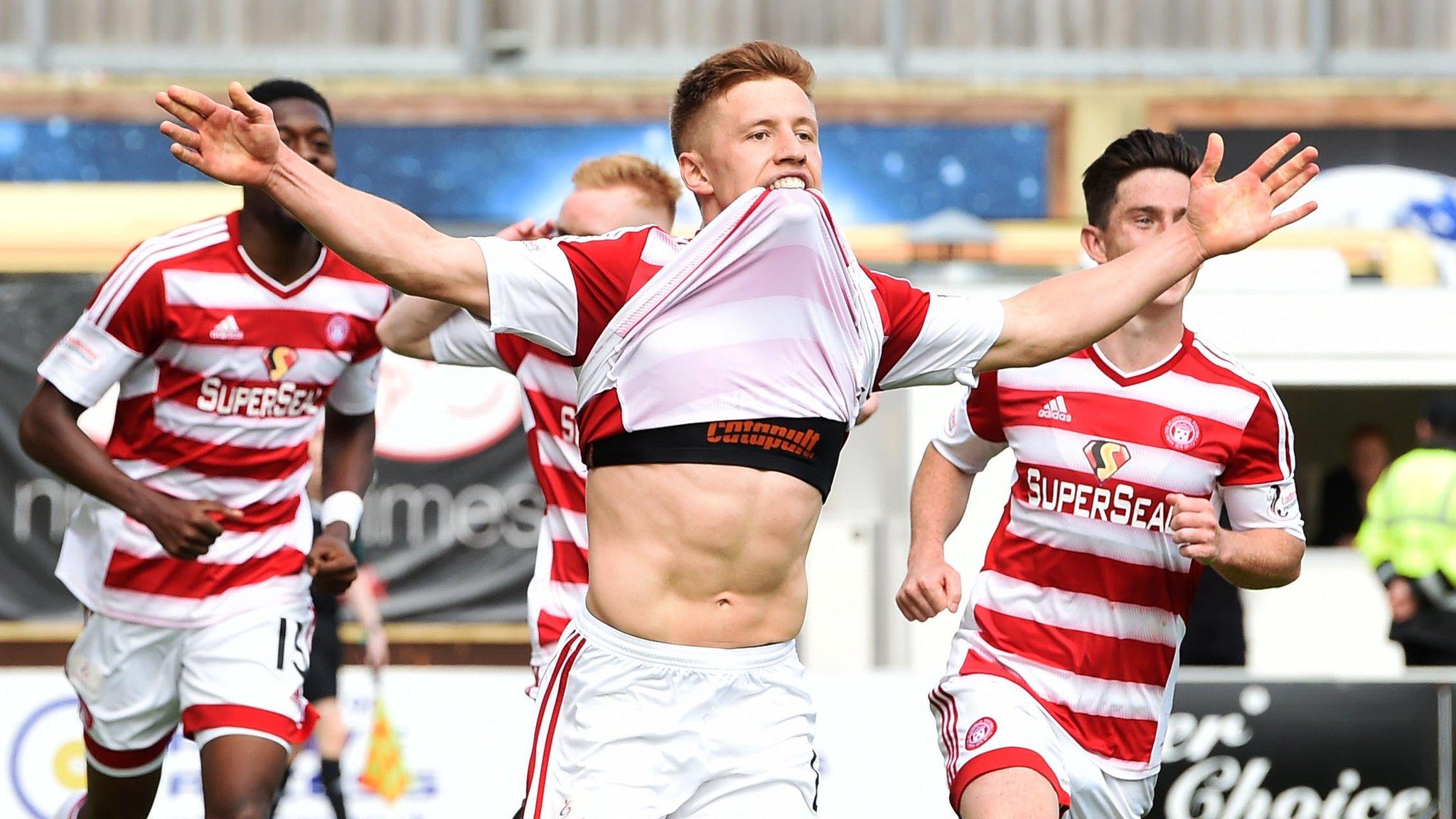 Greg Docherty celebrates