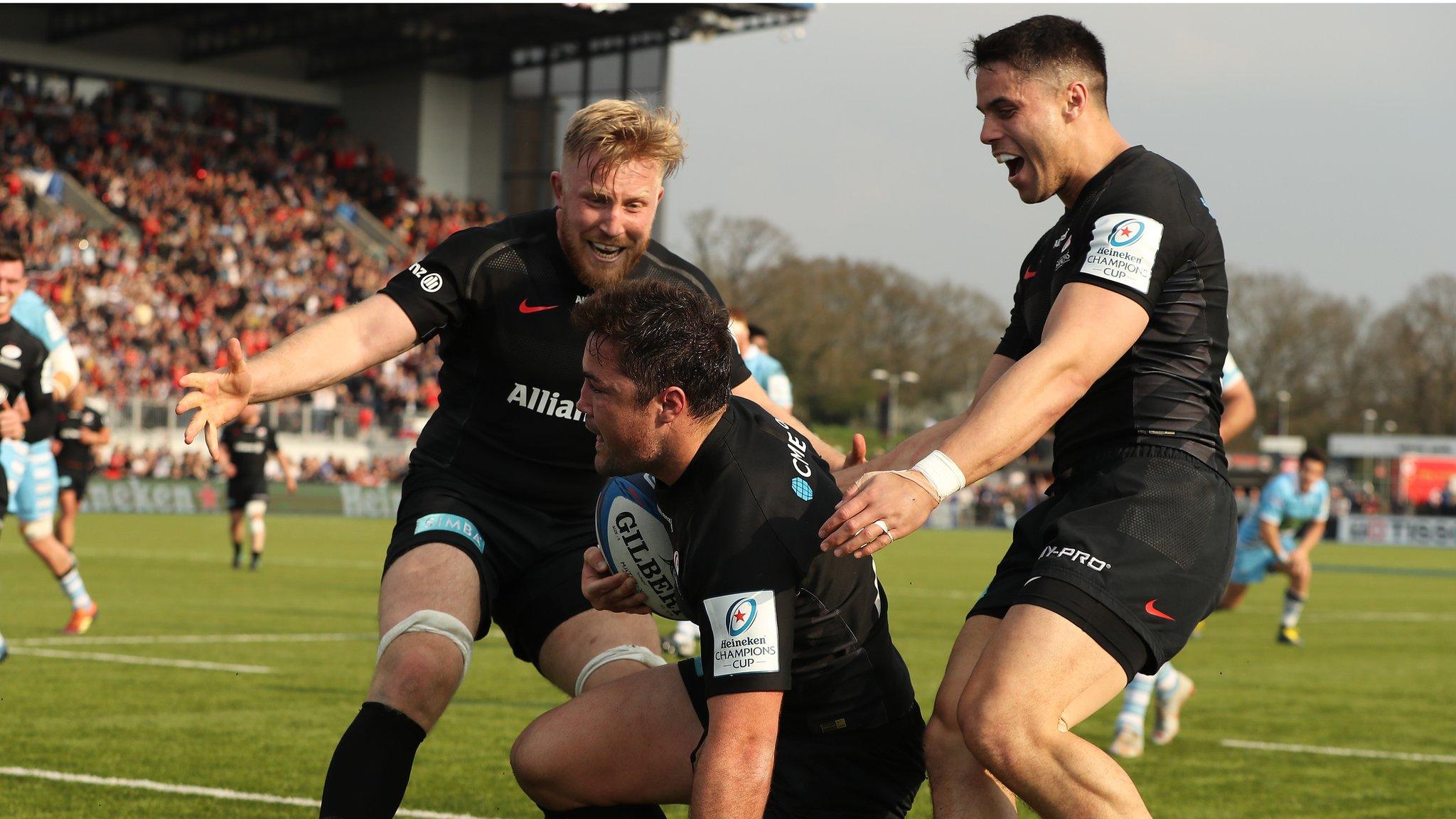 Saracens players celebrate a try