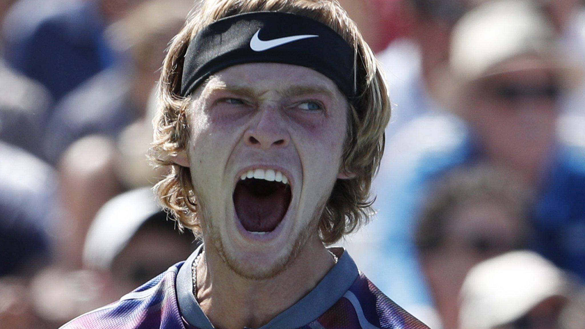 Andrey Rublev celebrates beating David Goffin