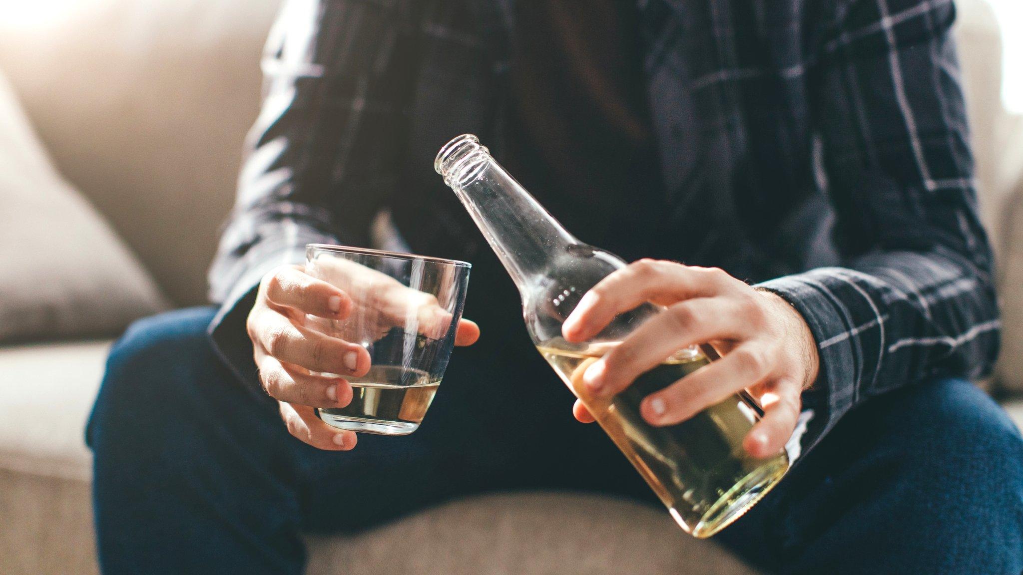 Man at home with beer