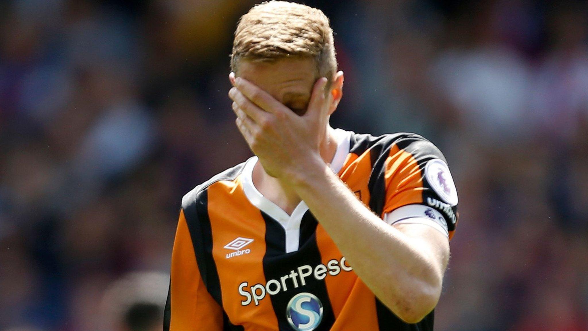 Hull City captain Michael Dawson reacts after the final whistle after his side is relegated