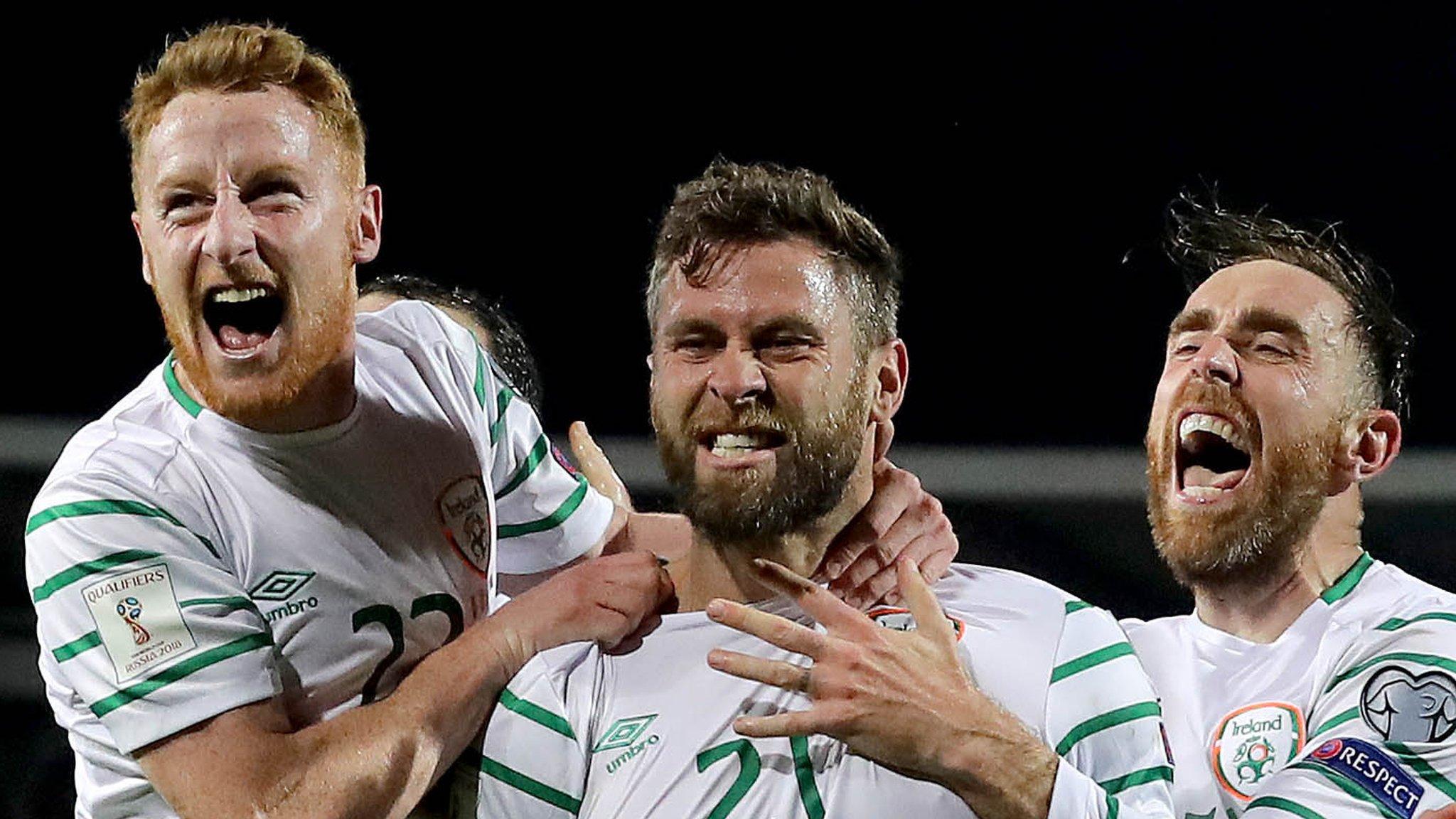 Daryl Murphy (centre) celebrates with Stephen Quinn (left) and Richard Keogh after his late Republic of Ireland equaliser