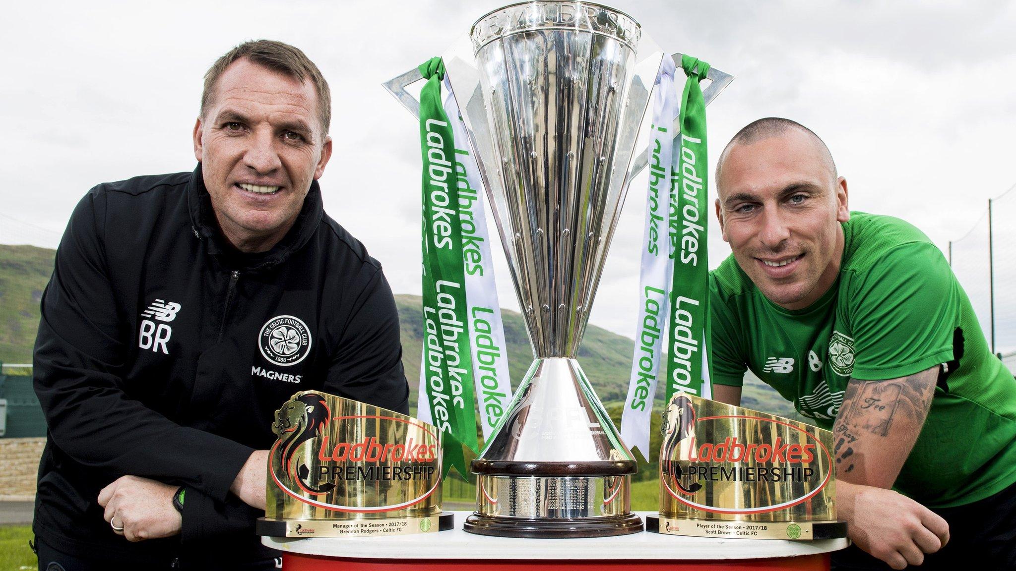 Celtic's Brendan Rodgers and Scott Brown with their sponsor's manager and player of the year awards and the Scottish Premiership trophy