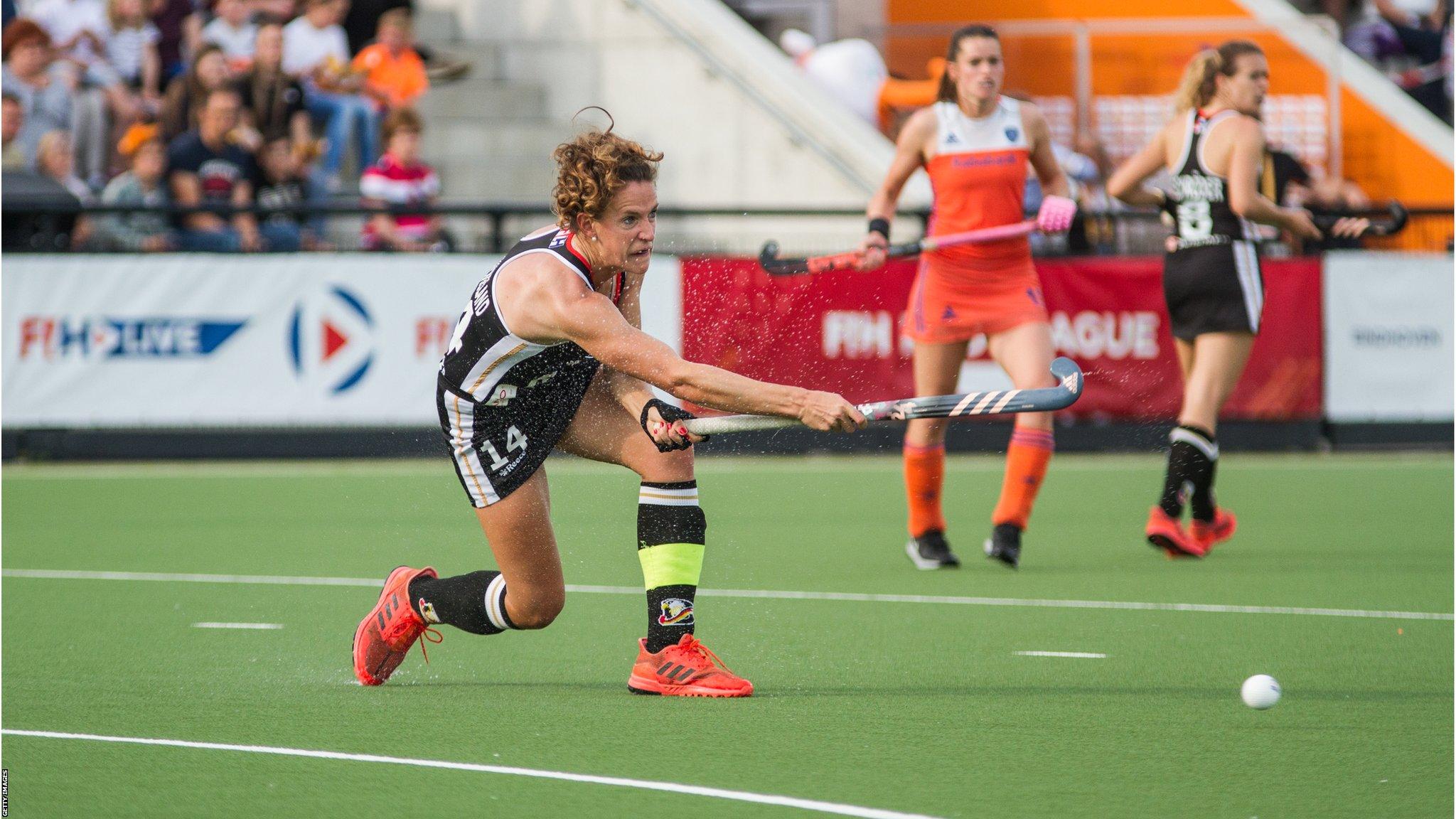 Eindhoven, Netherlands, 4 June: Janne Muller-Wieland of Germany (left) challenges for the ball during the Women's FIH Field Hockey Pro League match between Netherlands and Germany at HC Oranje-Rood. (Photo by Jorge Luis Alvarez Pupo/Getty Images)