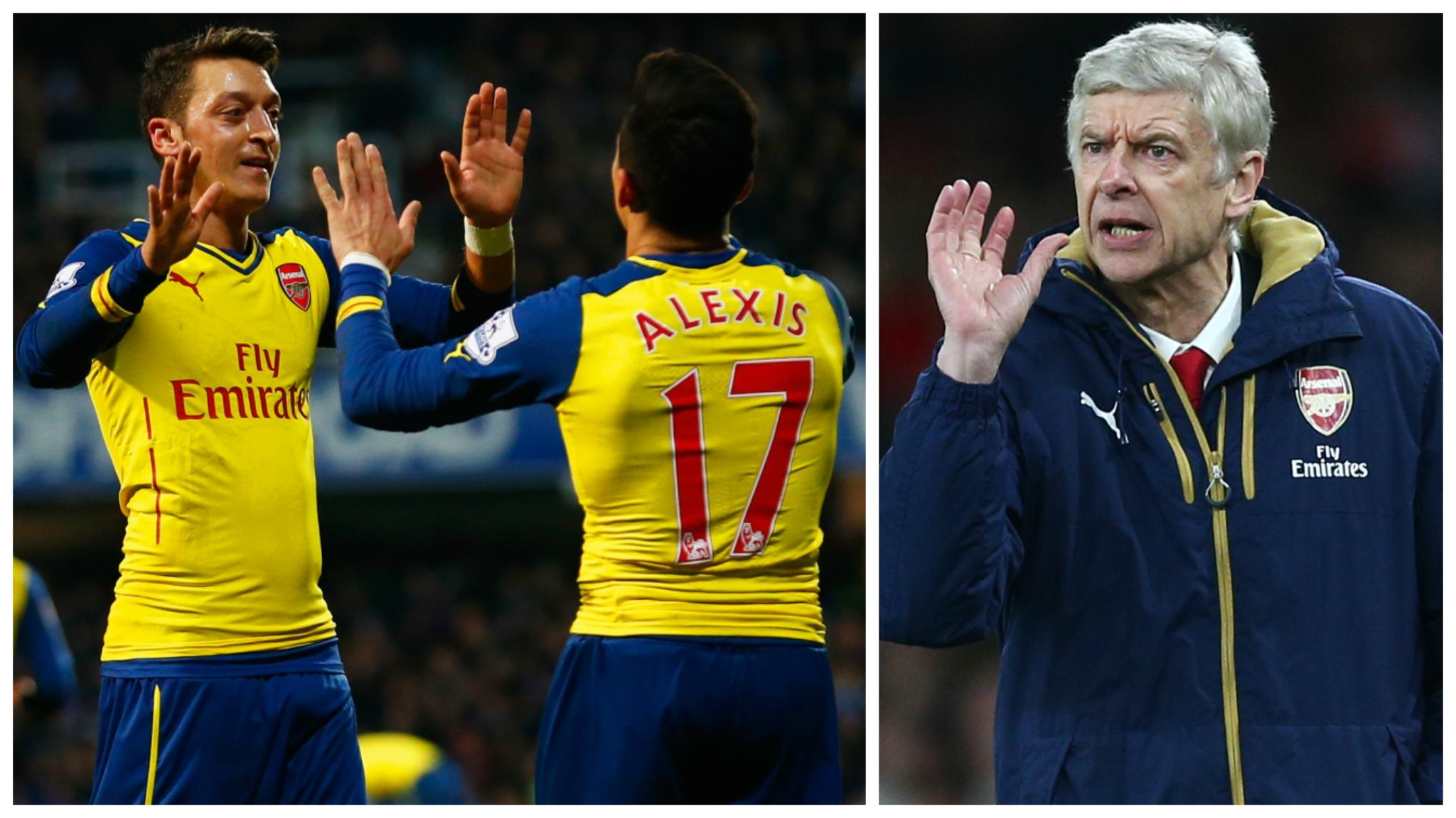 Arsenal's Mesut Ozil (left) and Alexis Sanchez, and Arsene Wenger