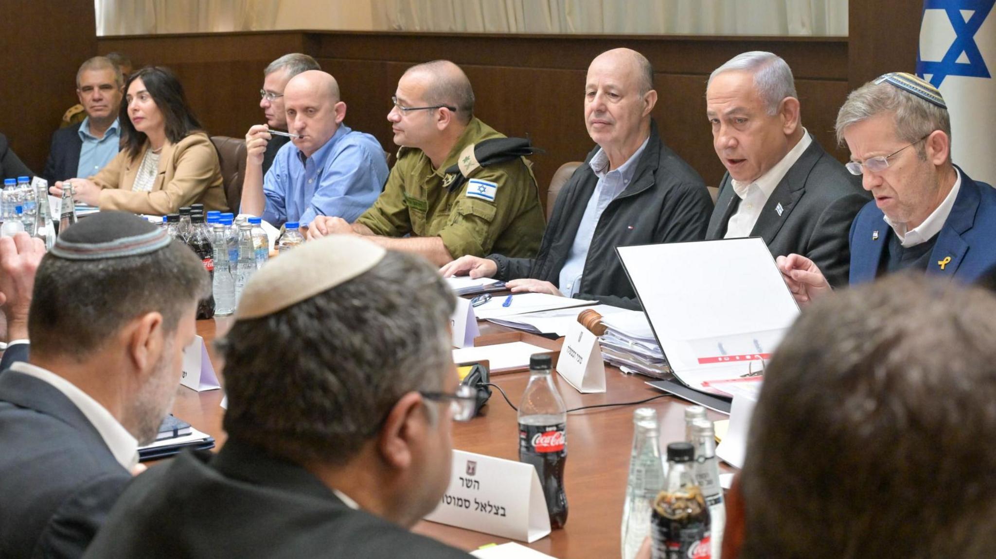 Prime Minister Benjamin Netanyahu (top row, 2nd right) speaks during an Israeli Security Cabinet meeting in Jerusalem (17 January 2025)