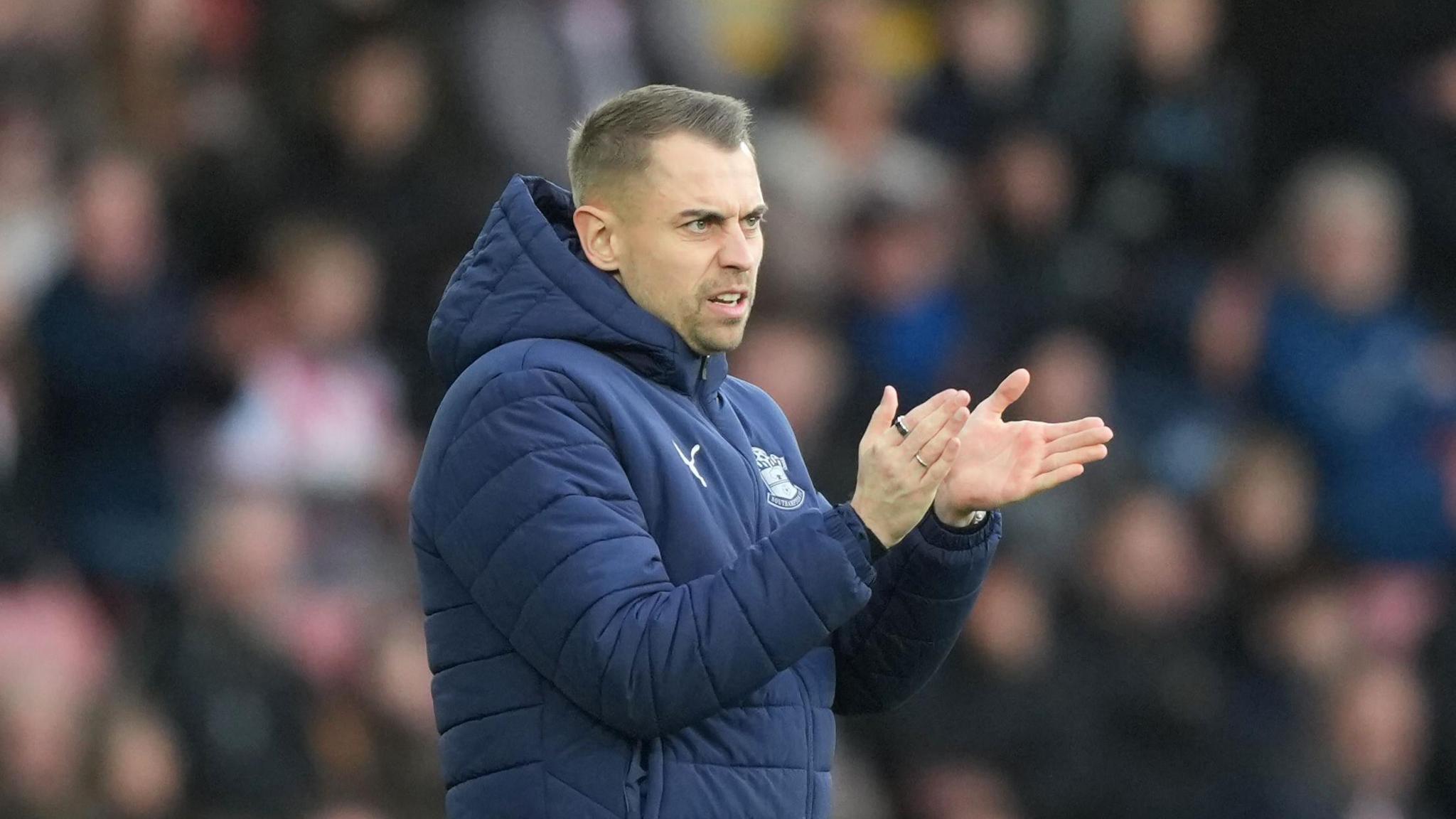 Sants boss Tonda Eckert claps encouragment to players