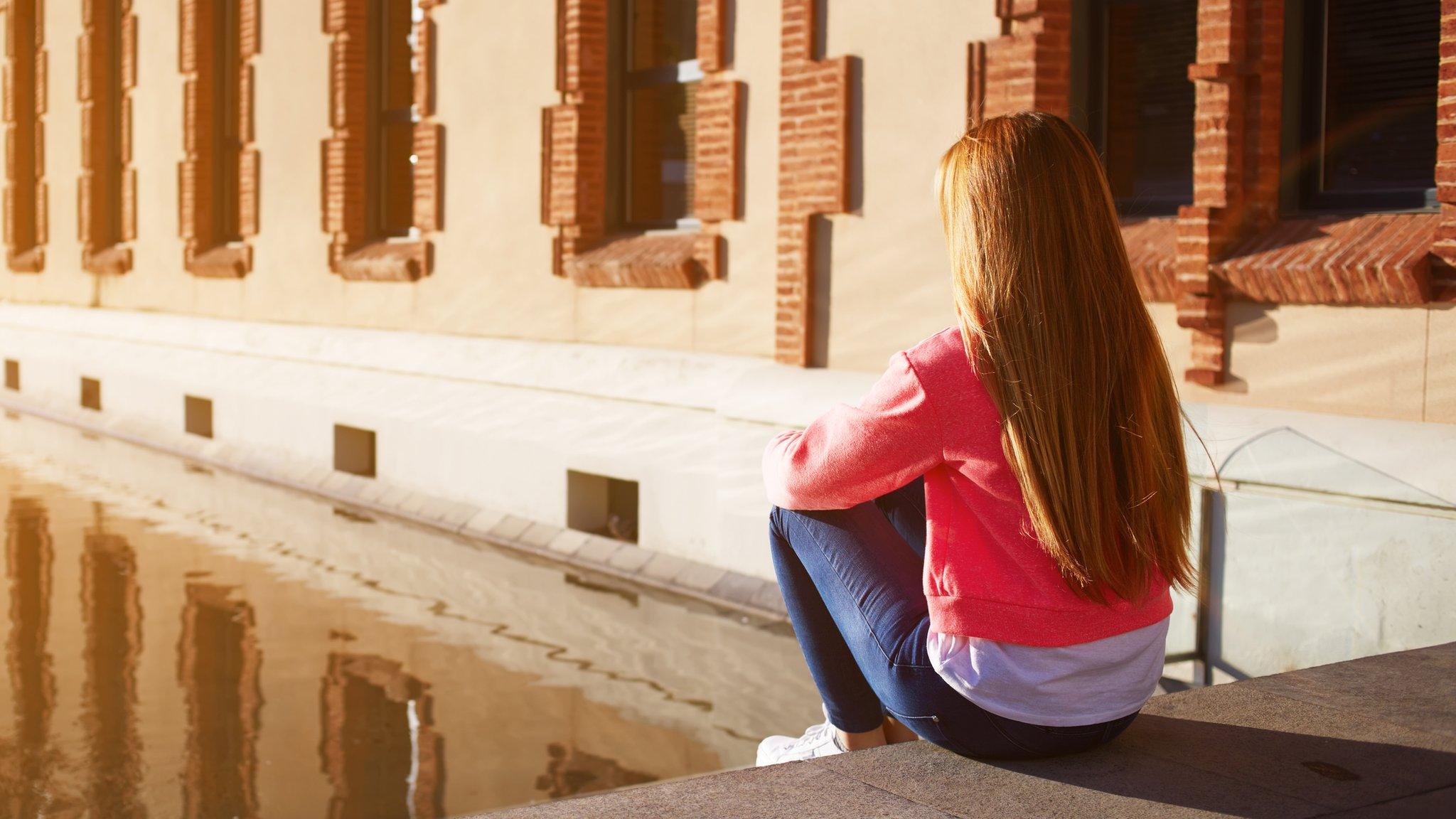 A young girl thinking