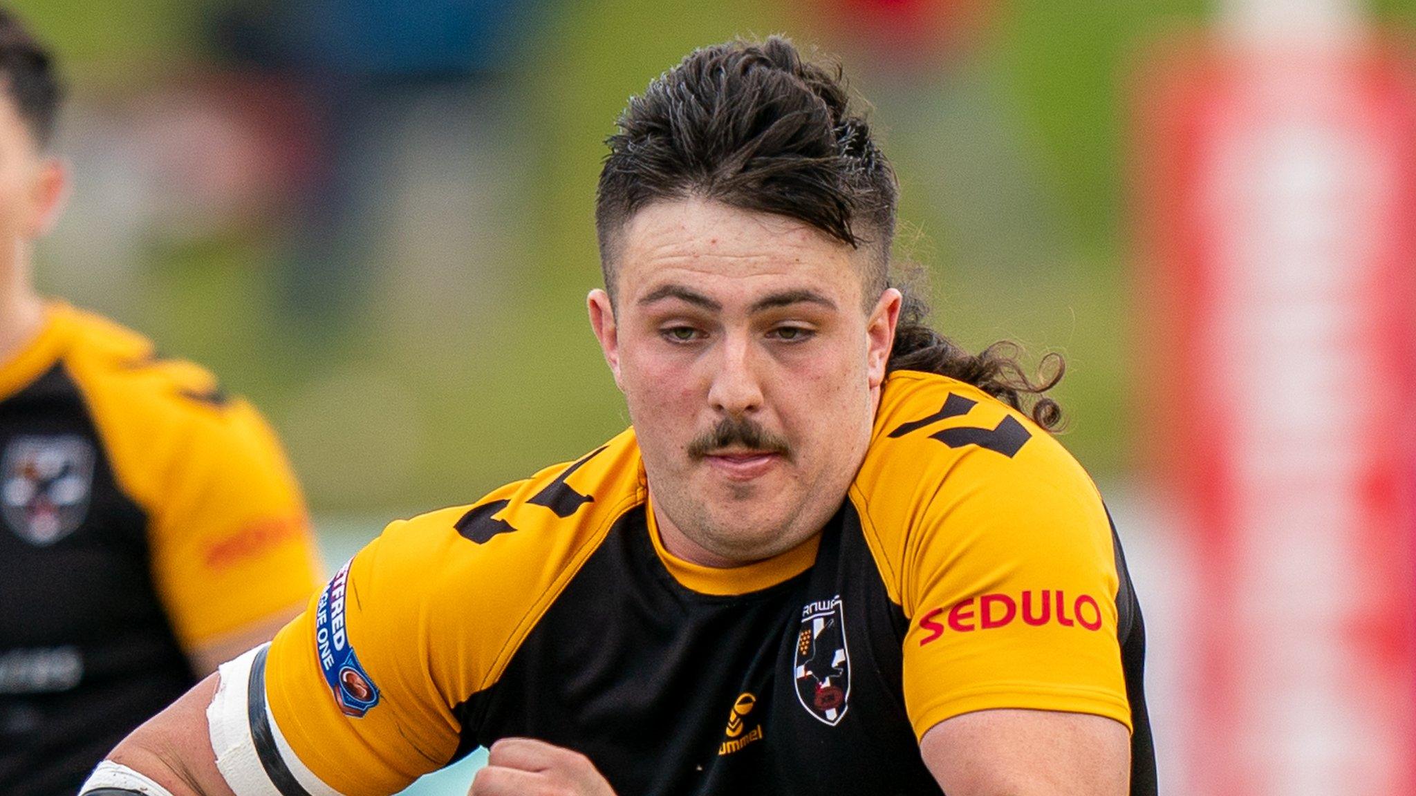 Charley Bodman runnng with the ball for Cornwall