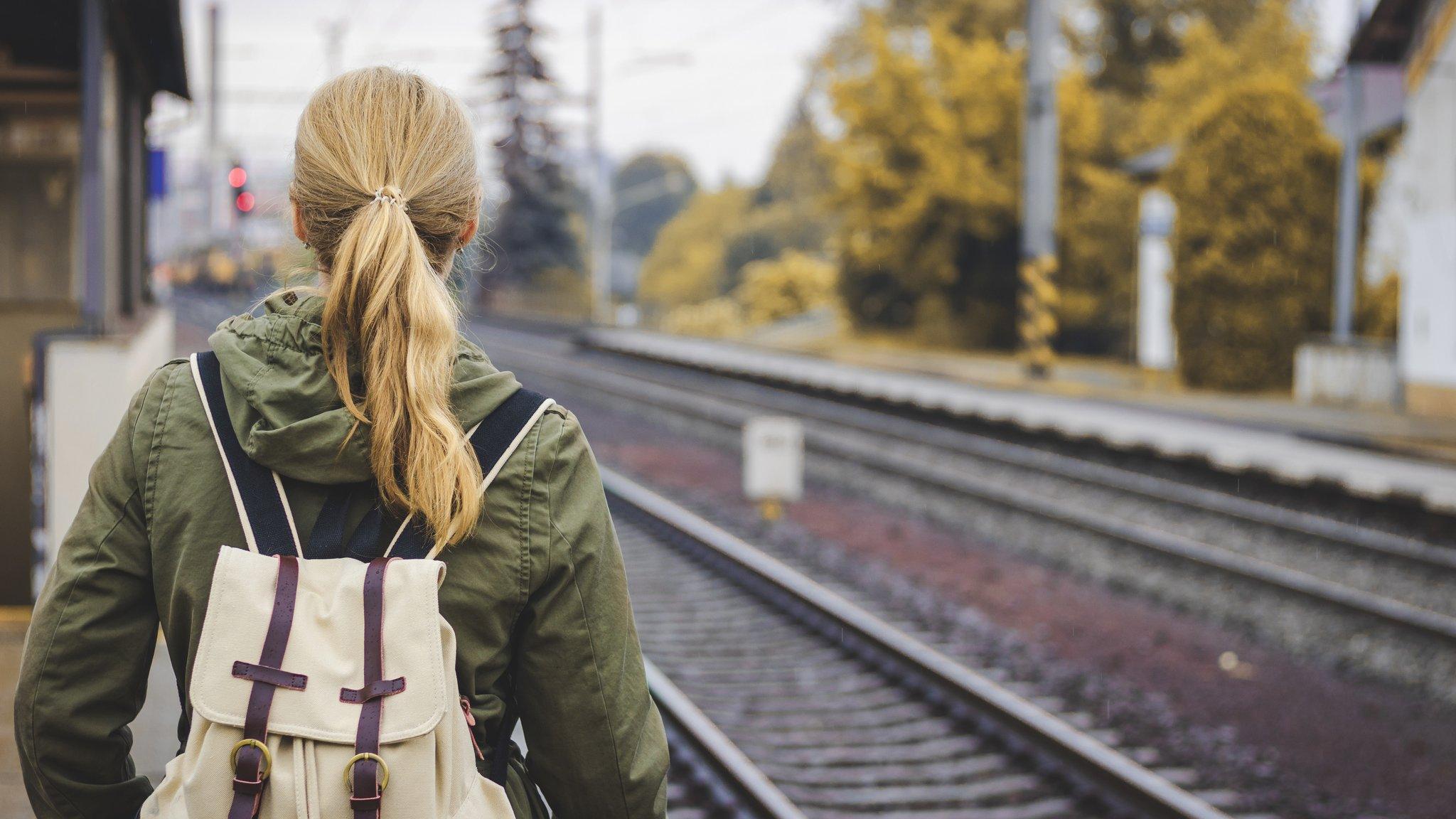 Woman waiting for a train