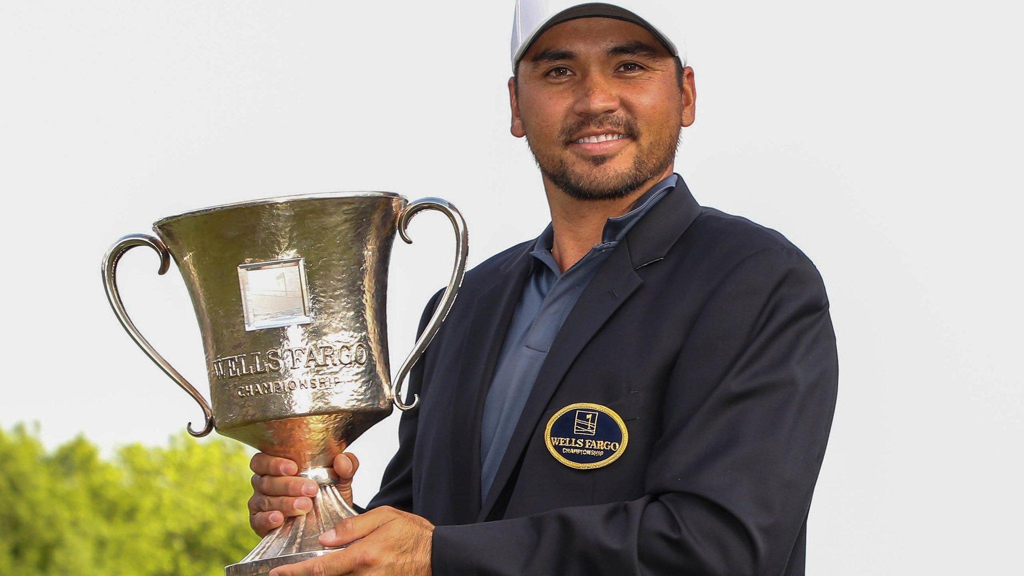 Jason Day with the Wells Fargo Championship trophy