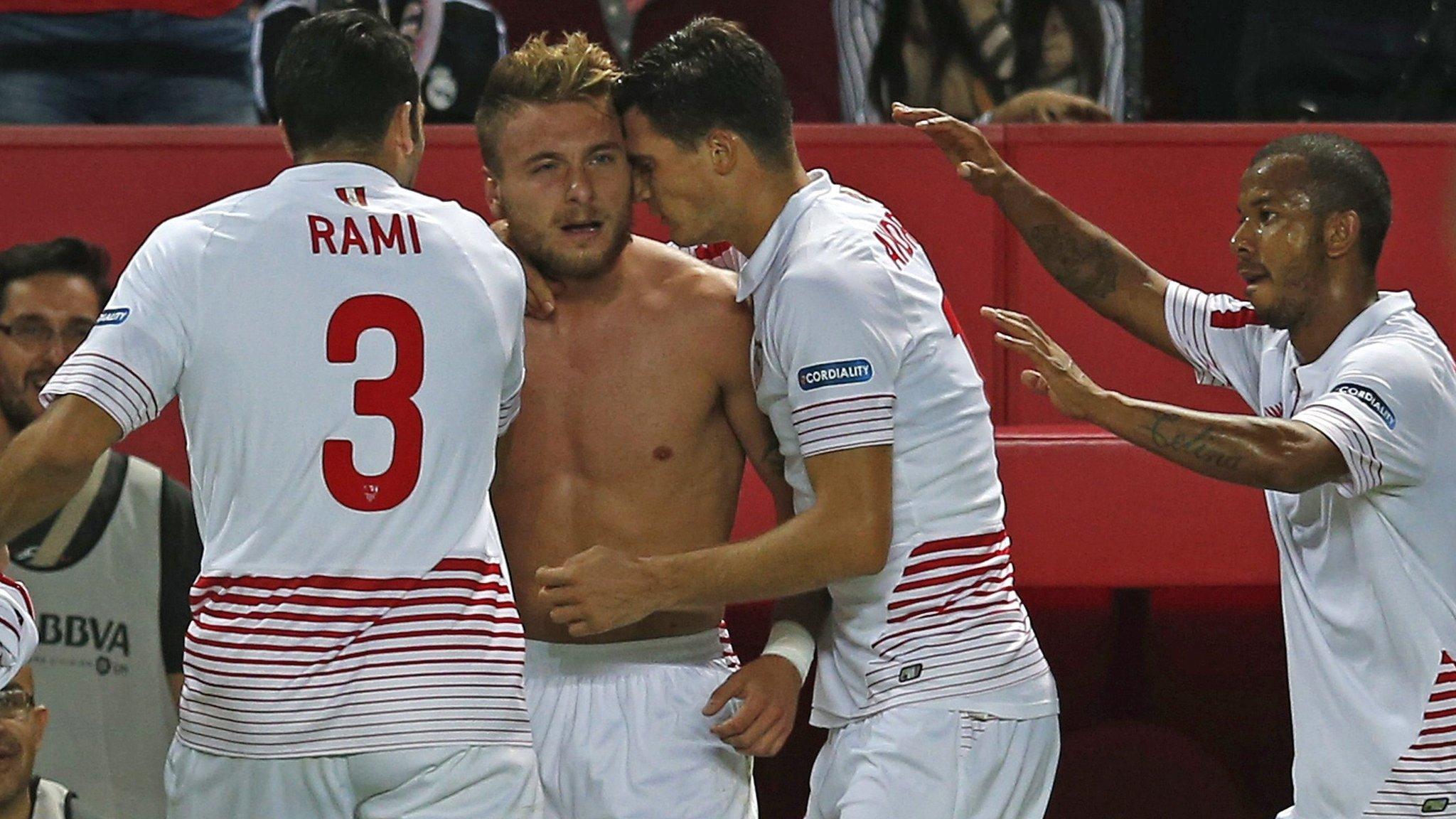 Sevilla FC players celebrate