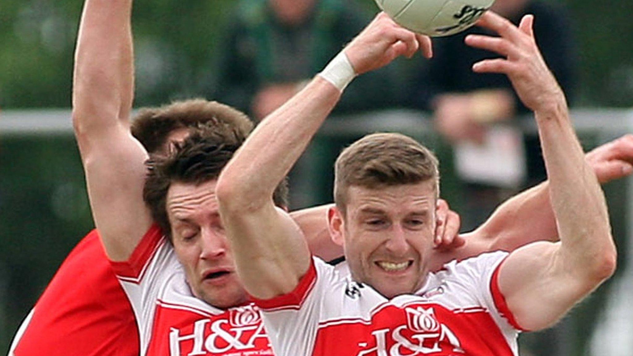 Derry duo James Kielt and Niall Holly battle to win possession at Owenbeg